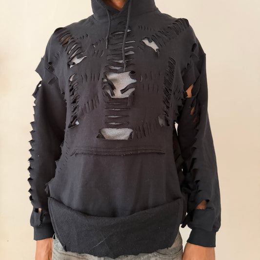 ASTROBOI* x Gildan ‘Mio’ black loose-fitting grunge ripped cut out hoodie with cut-outs throughout and deconstructed kangaroo pocket, front view.