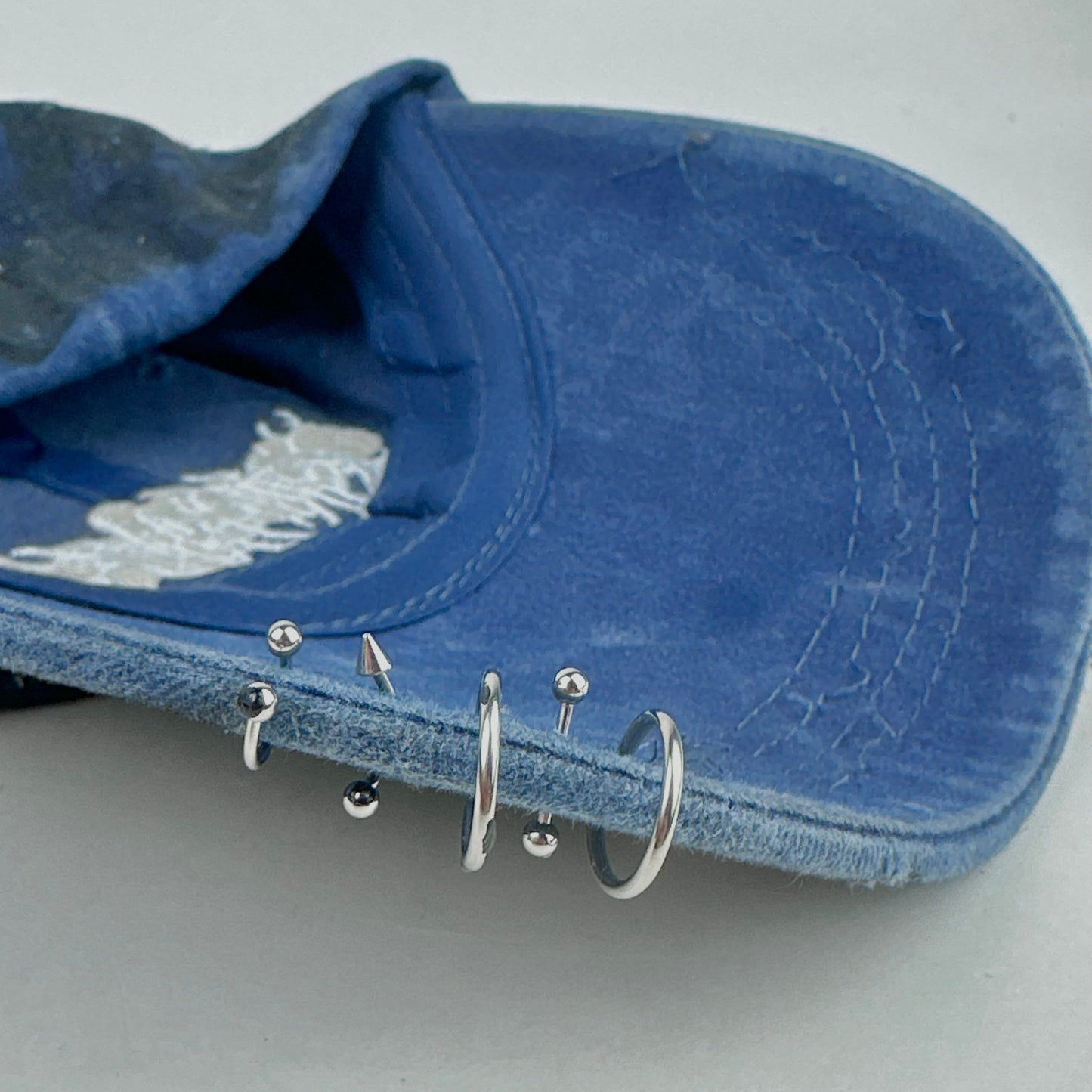 ASTROBOI* 'Dune' Black & Blue Indie Barbed Wire Distressed Pierced Hat