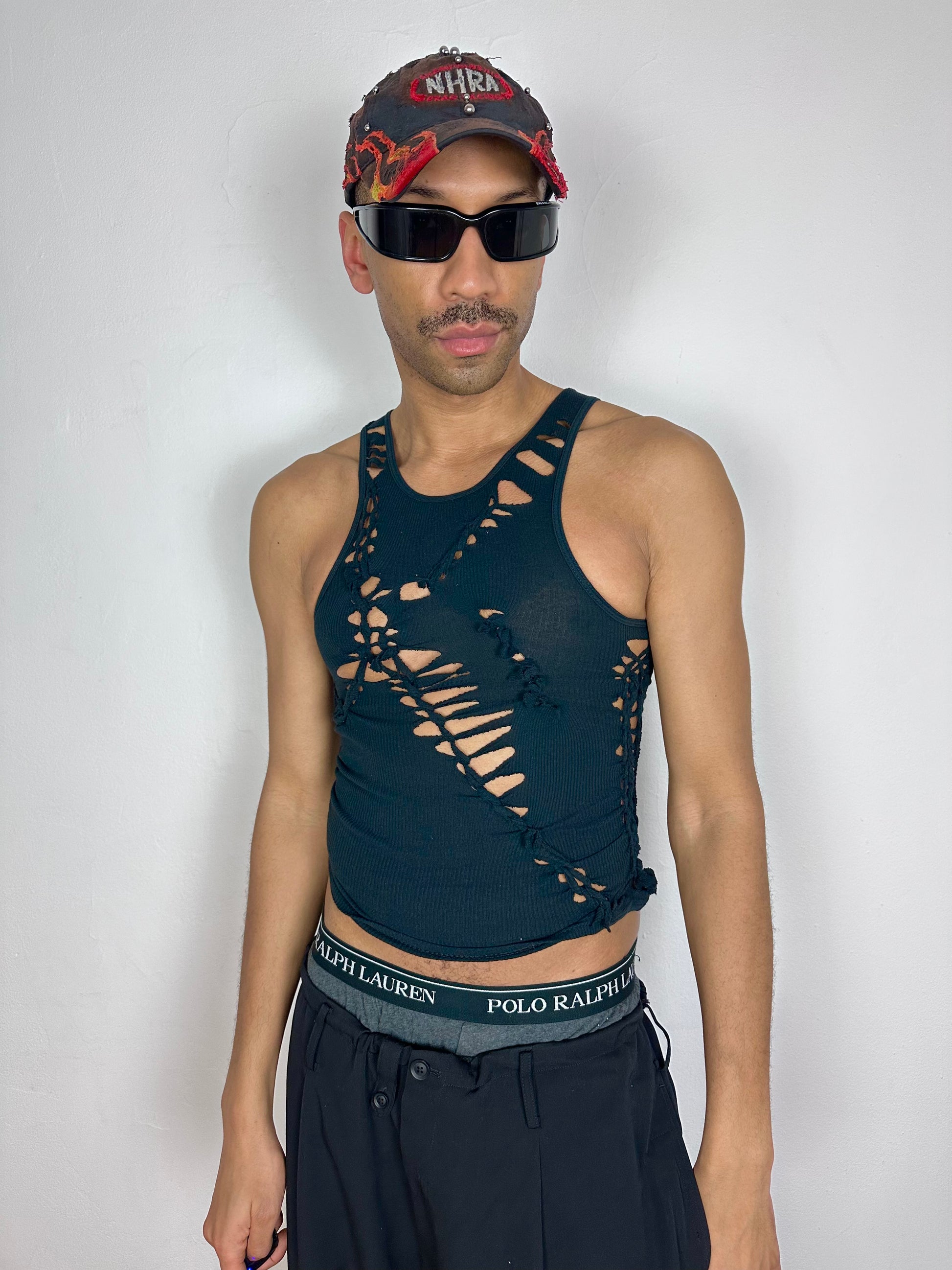 Model wearing ASTROBOI* x Gildan 'Octavos' black asymmetric braided twist tank top, styled full look, ASTROBOI* STUDIO NYC.