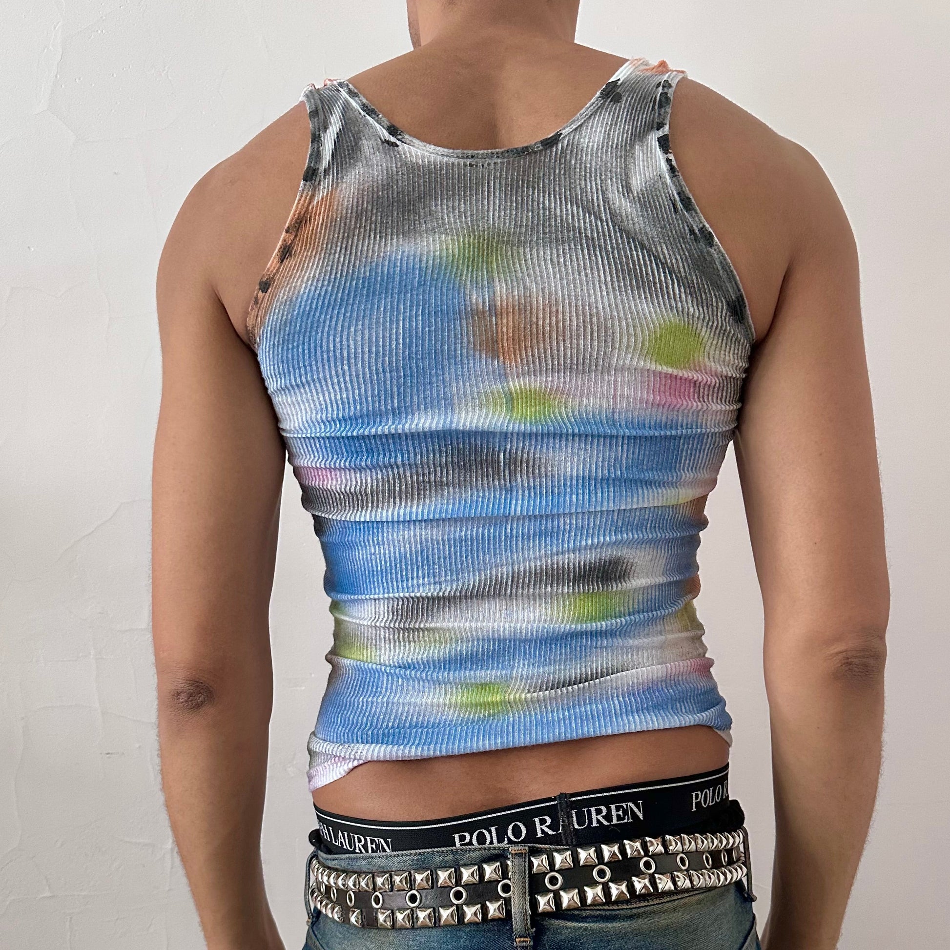ASTROBOI* x Hanes 'Counting Crows' white multicolored braided twist graphic tank top, rear view showing braid and paint detail construction, worn by male model.