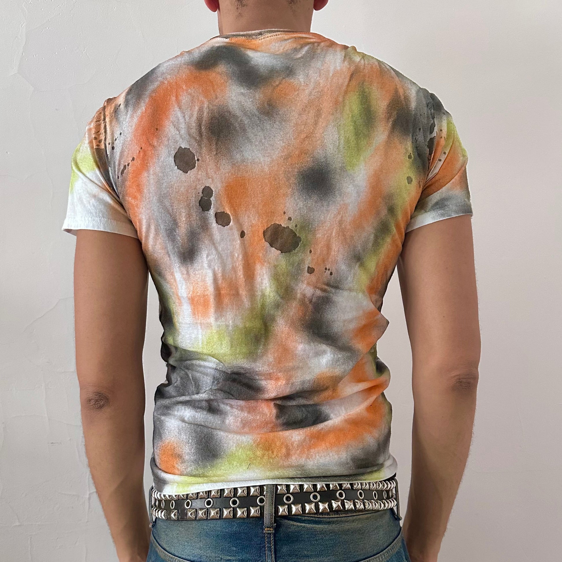 ASTROBOI* x Gildan 'Orange Haze' white multicolored painted graphic t-shirt, rear view showing abstract paint and braid construction, worn by male model.