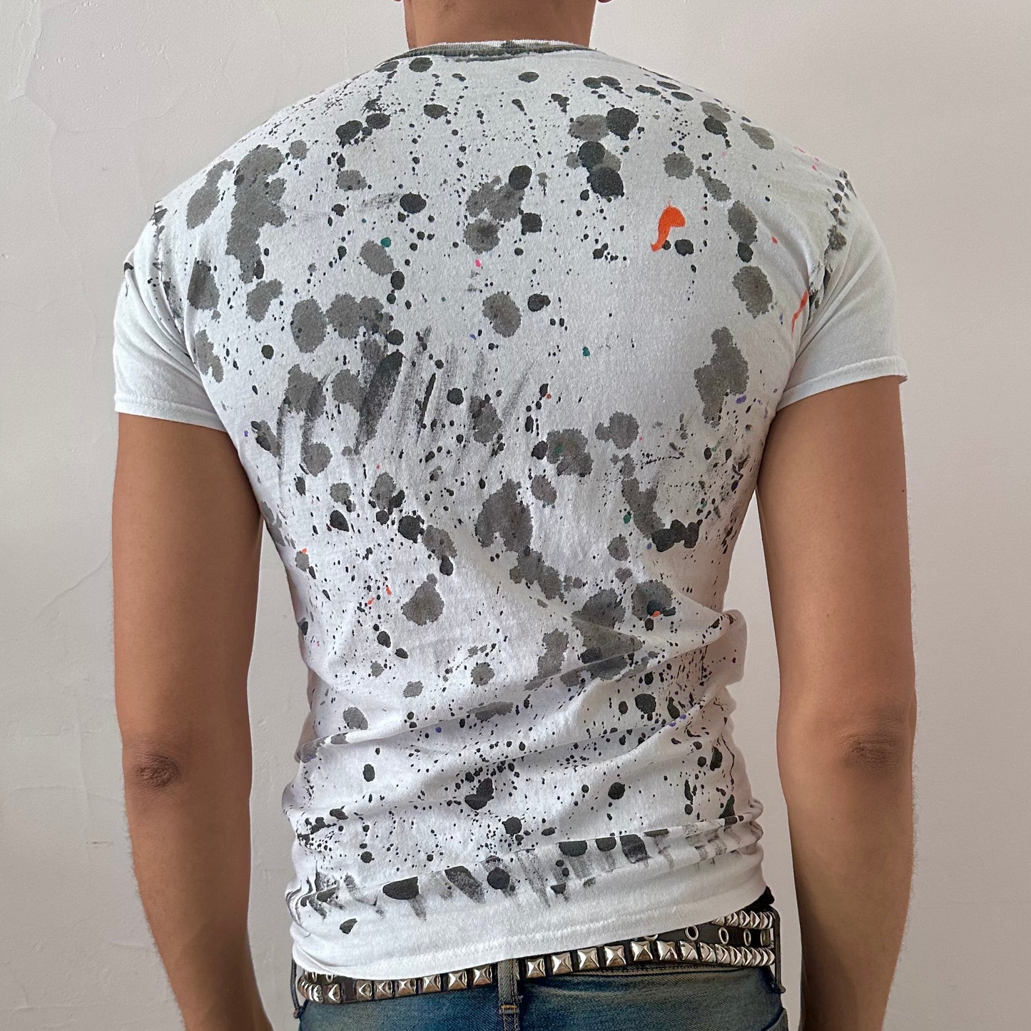 ASTROBOI* x Hanes 'Multicolor' white multicolor braided twist graphic t-shirt, rear view showing scribble confetti paint design and center braid, worn by male model.
