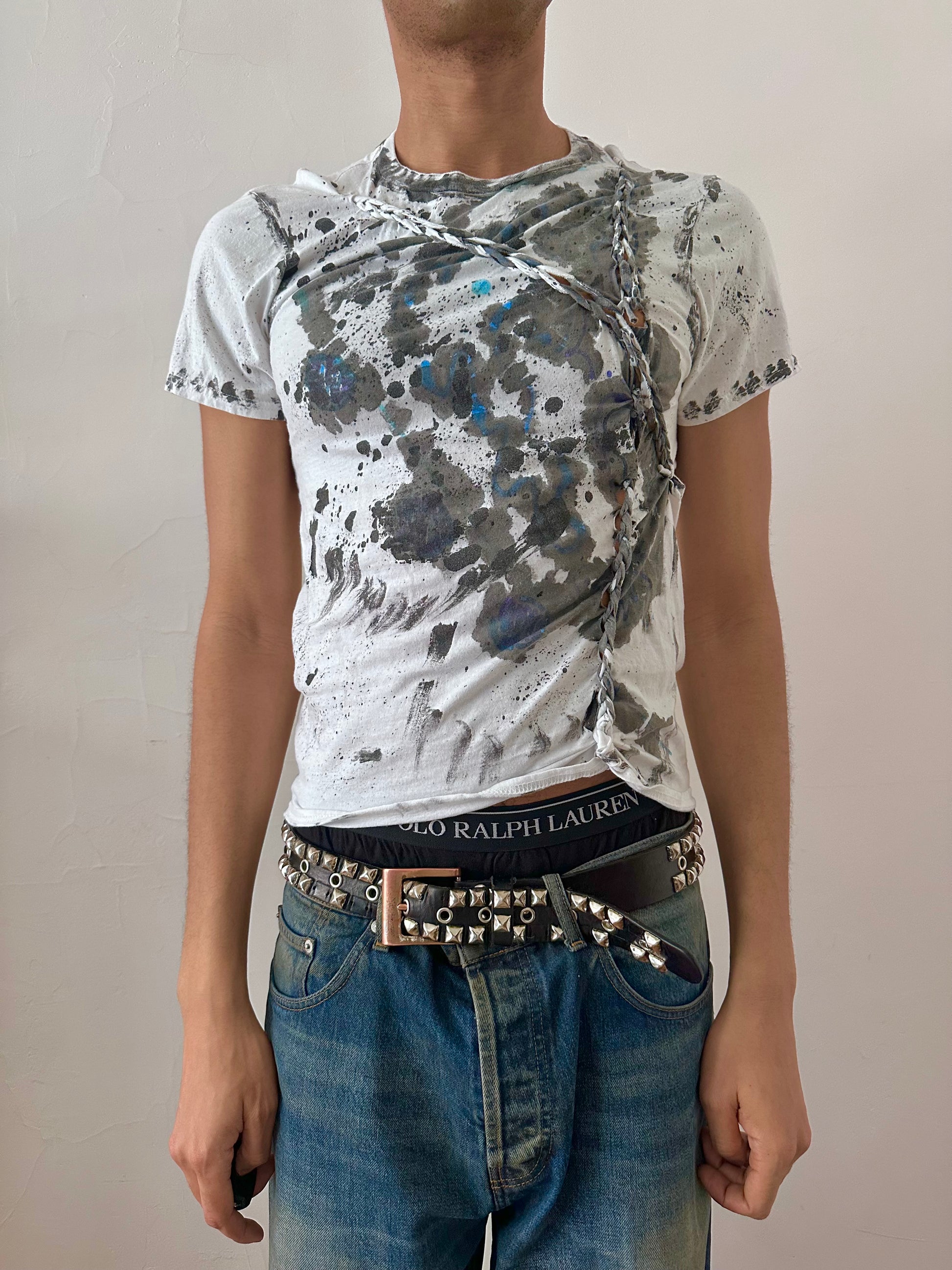 Male model wearing ASTROBOI* x Gildan 'Hidden Messages' white painted graphic t-shirt, styled full look, ASTROBOI* STUDIO NYC.