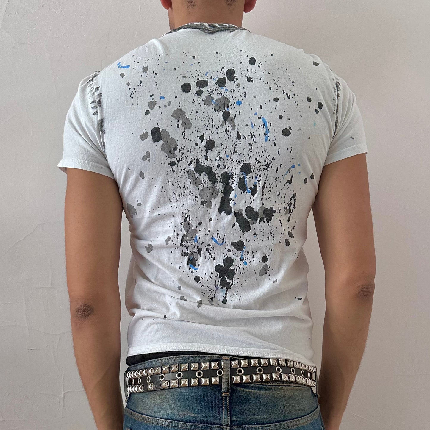 ASTROBOI* x Gildan 'Hidden Messages' white painted graphic t-shirt, rear view showing blue scribble and watercolor ink splatter design, worn by male model.