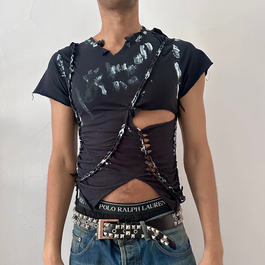 ASTROBOI* 'Duality' black close-fitting braided twist t-shirt with hand-braided arrangement, cut-outs, and white paint applied on braids throughout, front view.