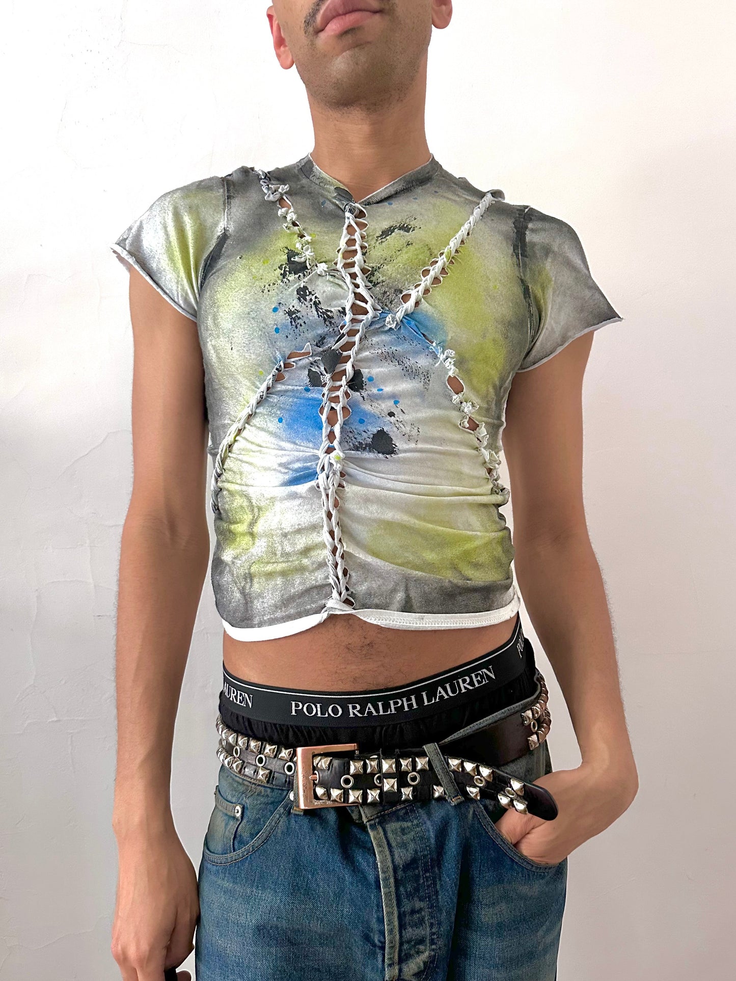 Male model wearing ASTROBOI* x Gildan 'Algae' white braided twist printed t-shirt, styled full look, ASTROBOI* STUDIO NYC.