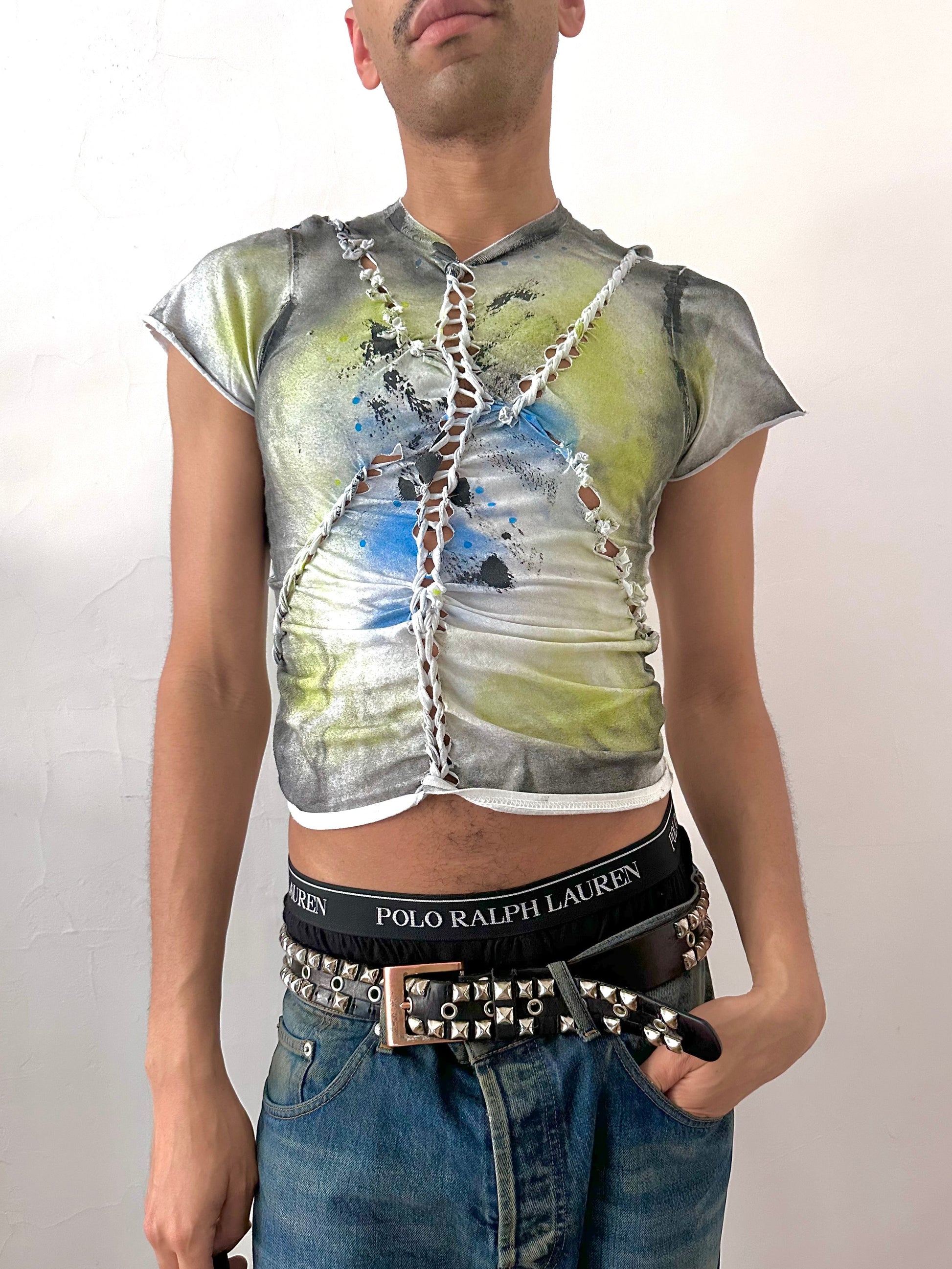Male model wearing ASTROBOI* x Gildan 'Algae' white braided twist printed t-shirt, styled full look, ASTROBOI* STUDIO NYC.