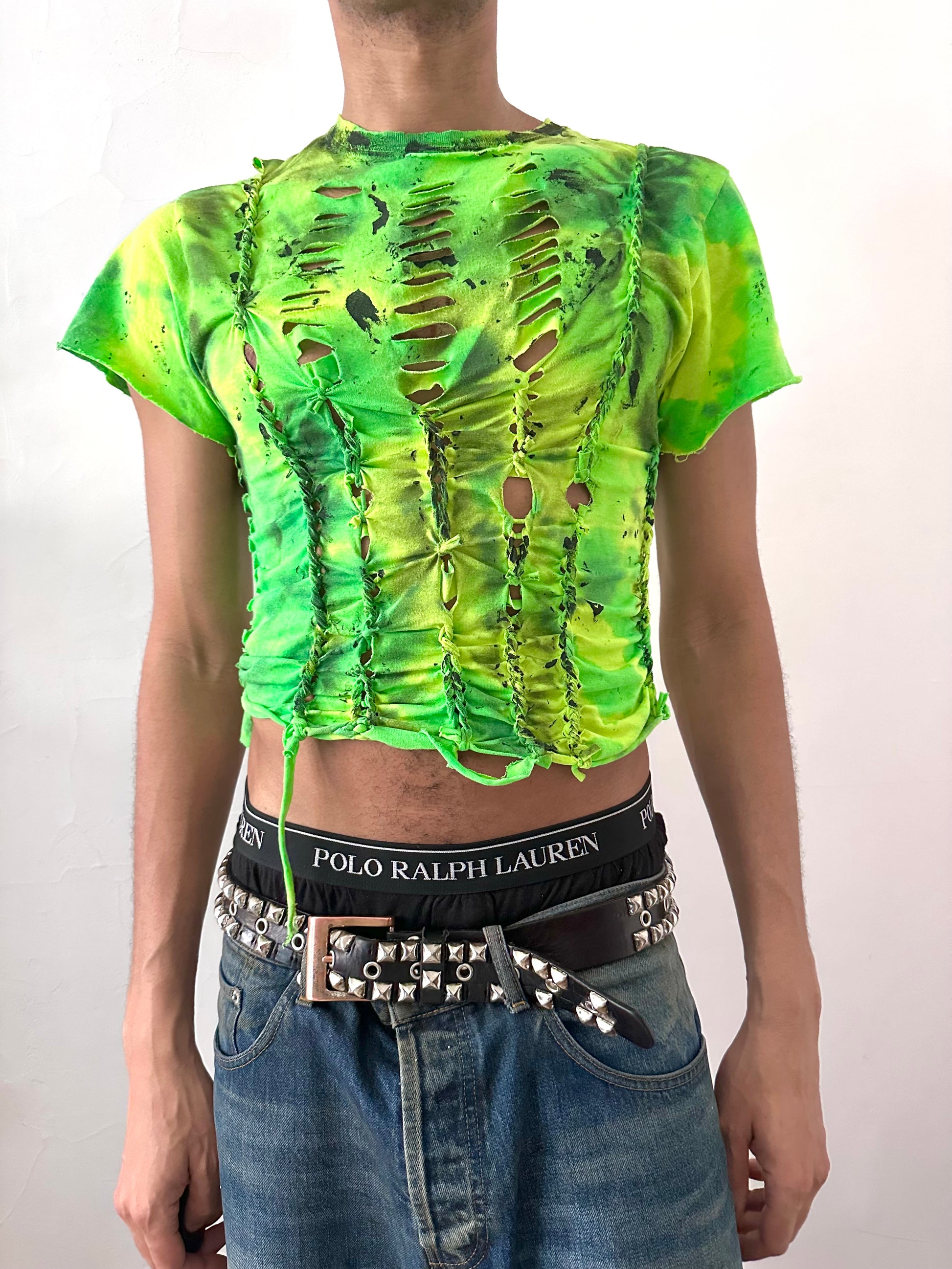 Male model wearing ASTROBOI* x Gildan 'Sage Pulse' green tie dye braided twist grunge t-shirt, styled full look, ASTROBOI* STUDIO NYC.