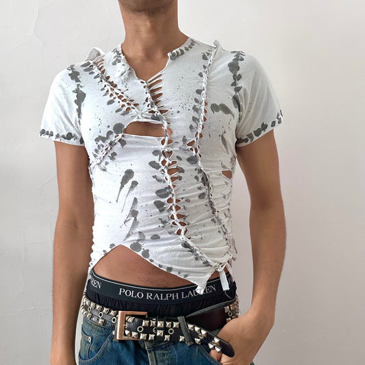 ASTROBOI* x Gildan '1001' white close-fitting braided twist t-shirt with hand-braided arrangement, cut-outs, and bold black painted pattern throughout, front view.