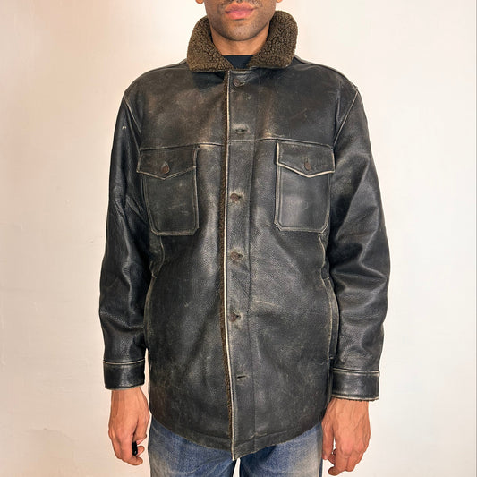 Cover of Vintage GAP blackish-brown leather shearling jacket with sherpa collar and interior, chest and hip pockets, rugged fatigued finish, size XL.