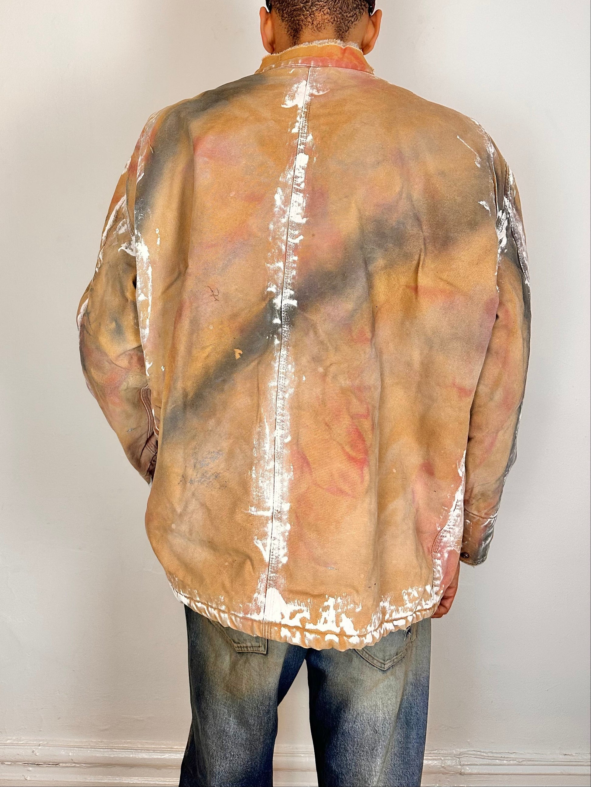 Back of ASTROBOI* Big Smith tan workwear jacket with quilted lining, boxy fit, deconstructed collar, and black red white paint detailing, size XL.