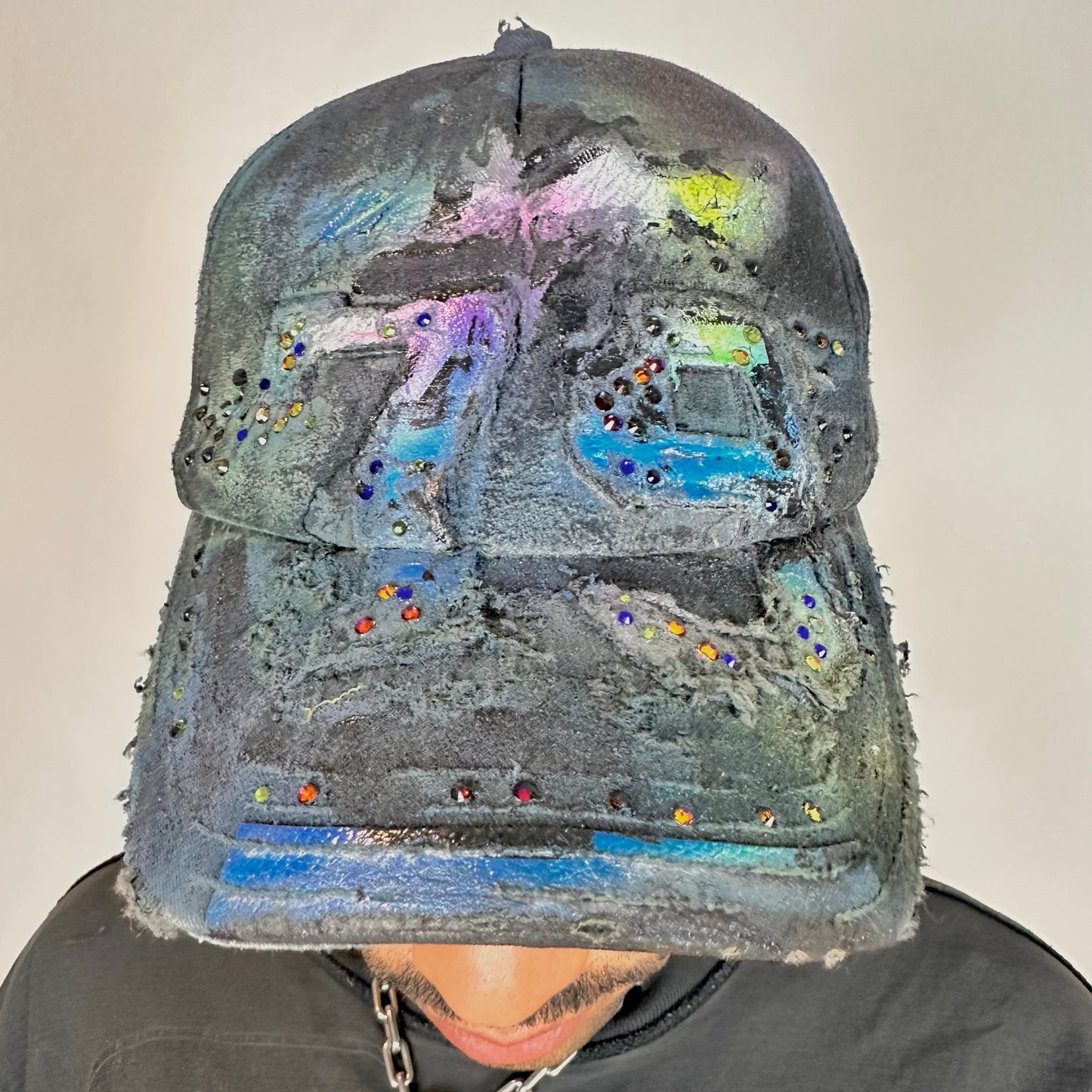 Cover photo of ASTROBOI* blue rainbow tropical Y2K hat with multicolored rhinestones, hand-painted shading, and adjustable strap back