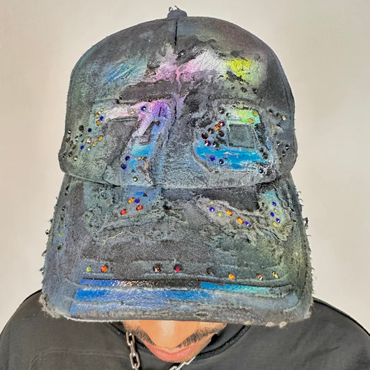 Cover photo of ASTROBOI* blue rainbow tropical Y2K hat with multicolored rhinestones, hand-painted shading, and adjustable strap back