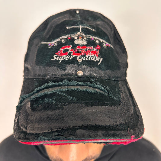 Cover image of ASTROBOI* C5M Super Galaxy black baseball cap with resin-sealed rhinestone logo patch and adjustable strap, hand-customized in NYC