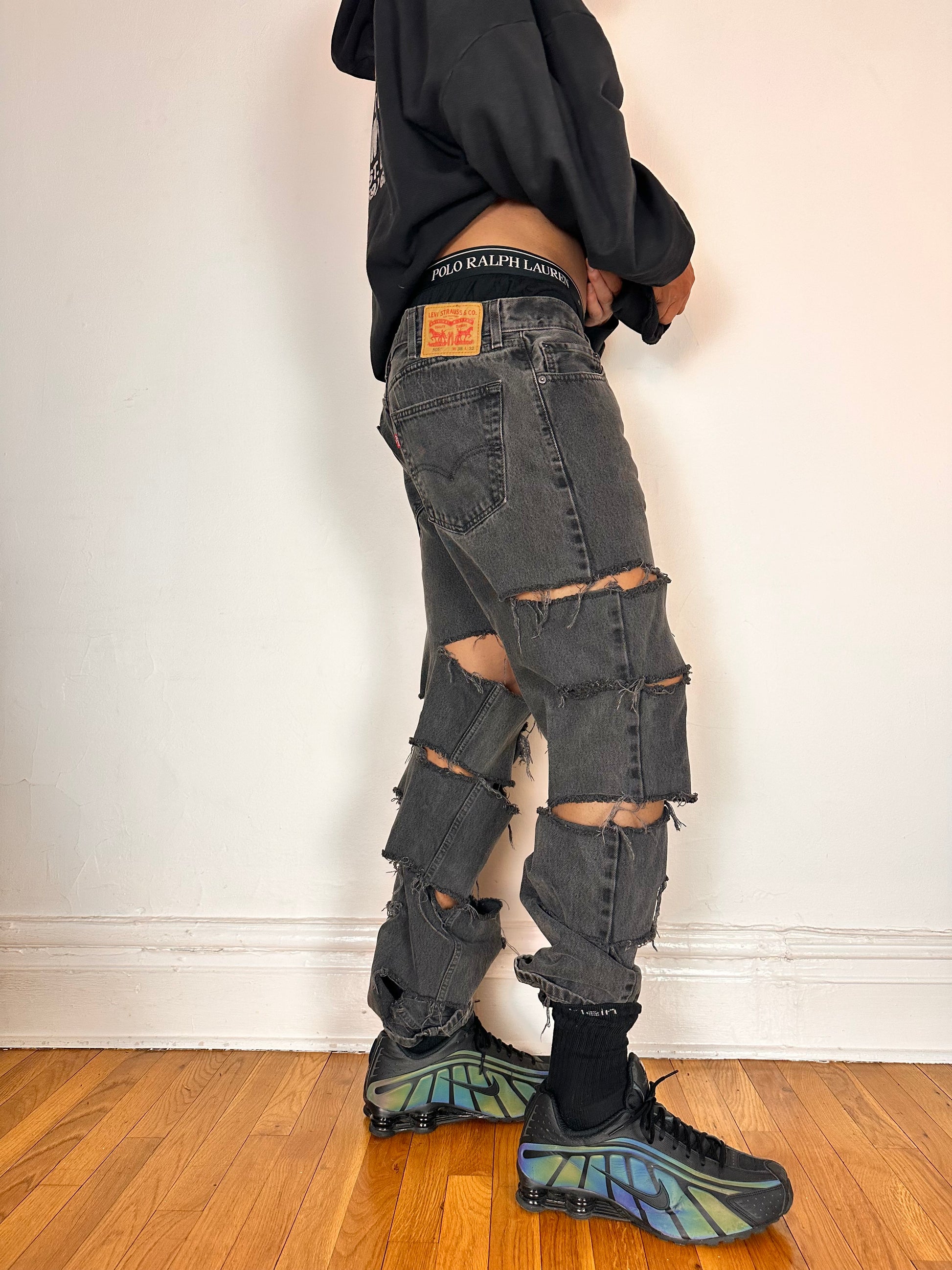 Right side of ASTROBOI* x Levi’s gray ripped jeans with side slashes and straight leg fit, size 36x32, custom distressed in Brooklyn