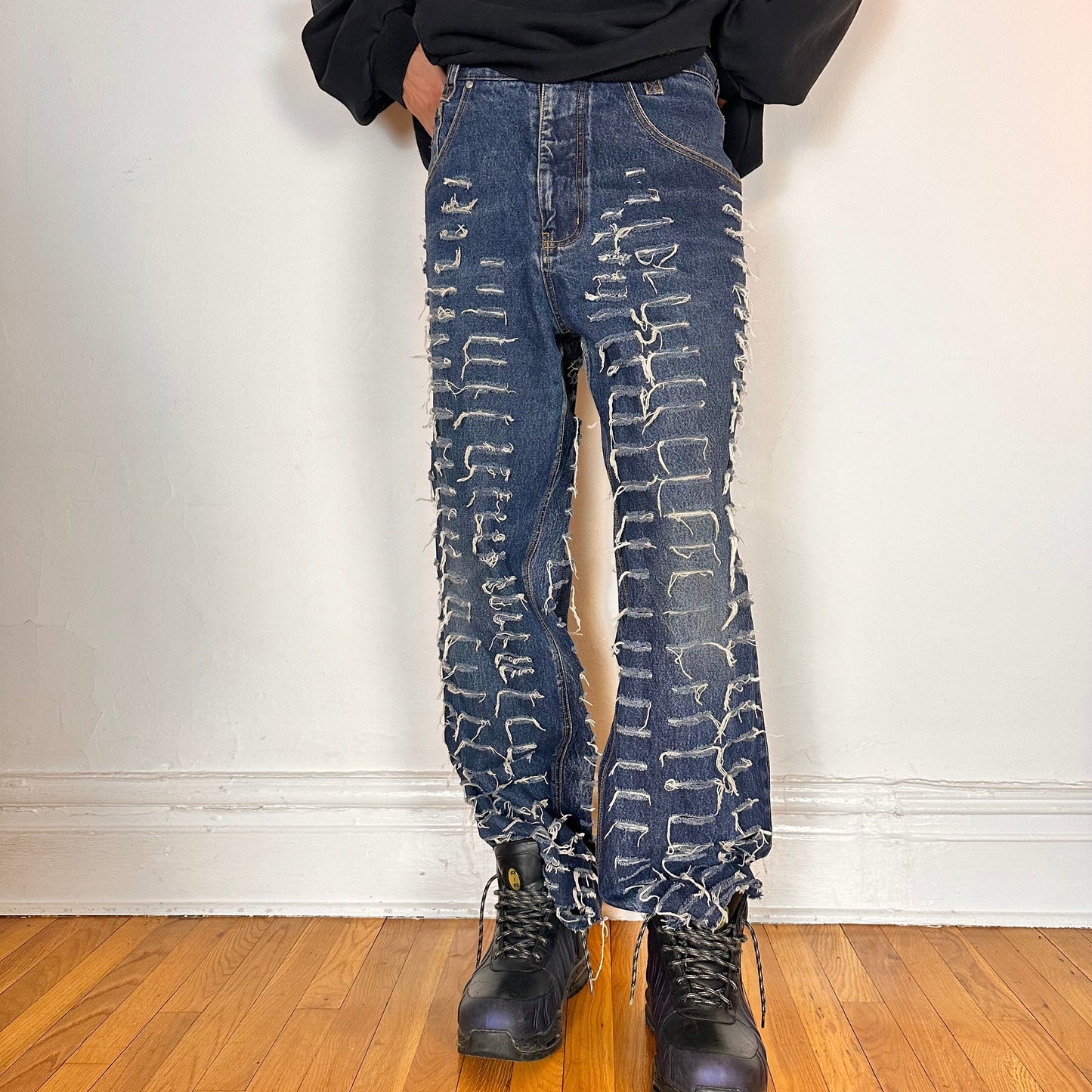 Cover photo of ASTROBOI* blue slashed grunge faded ripped jeans with thigh and leg slashes, relaxed leg fit, size 31x34, customized in NYC