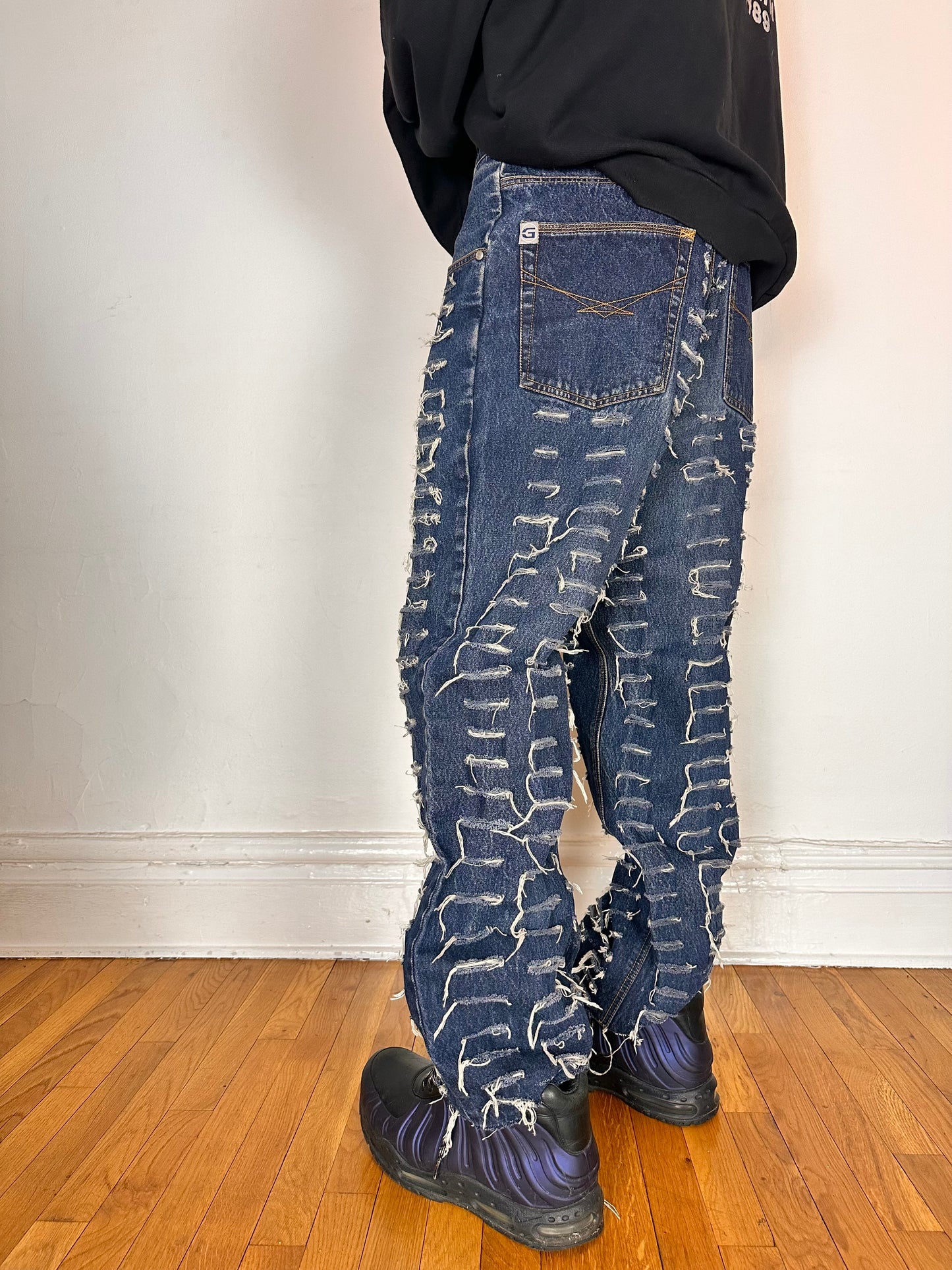Back image 2 ASTROBOI* blue slashed grunge faded ripped jeans with thigh and leg slashes, relaxed leg fit, size 31x34, customized in NYC