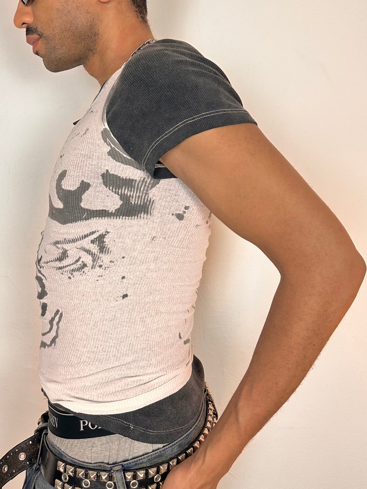 Left side of ASTROBOI* x Hanes white tank top with black hand-painted Y2K tattoo print, size Small, slim fit, made in NYC