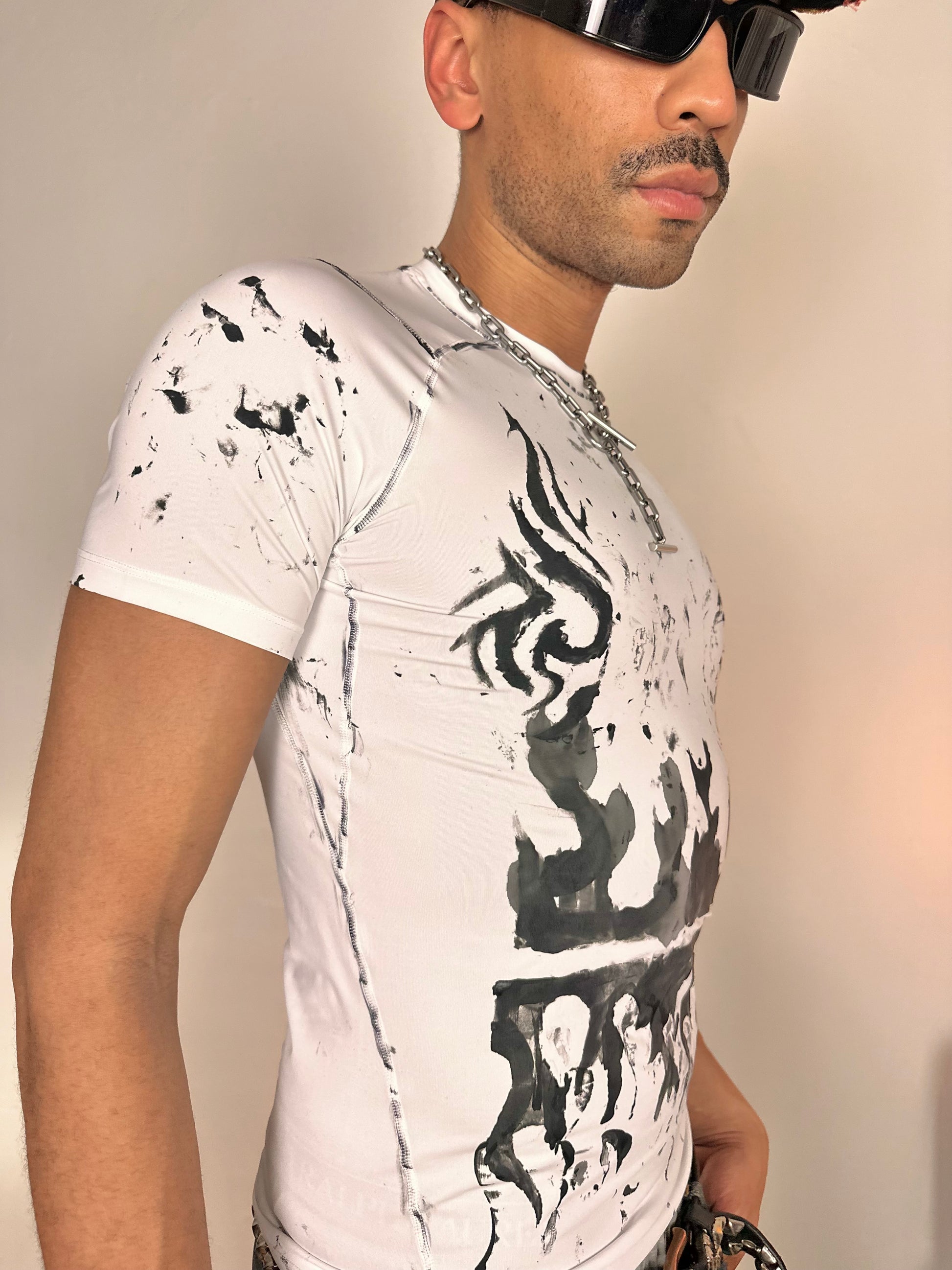 Front right of ASTROBOI* Flames white and black tattoo print compression top with stretch fabric and tight fit, hand-painted design, size Medium