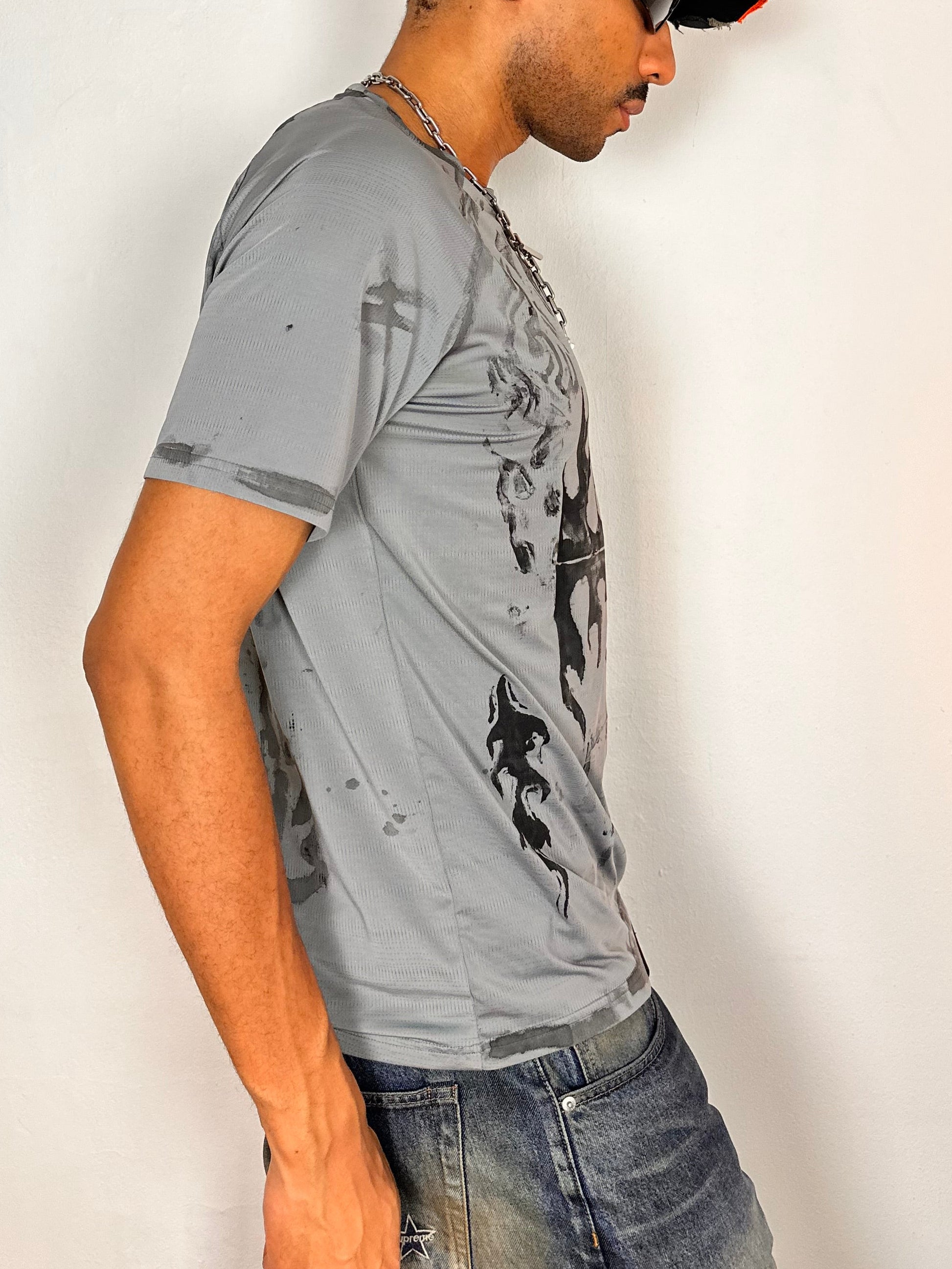 Right side of ASTROBOI* Flames grey and black tattoo print compression top with moisture-wicking sports fabric and tight fit, size Large