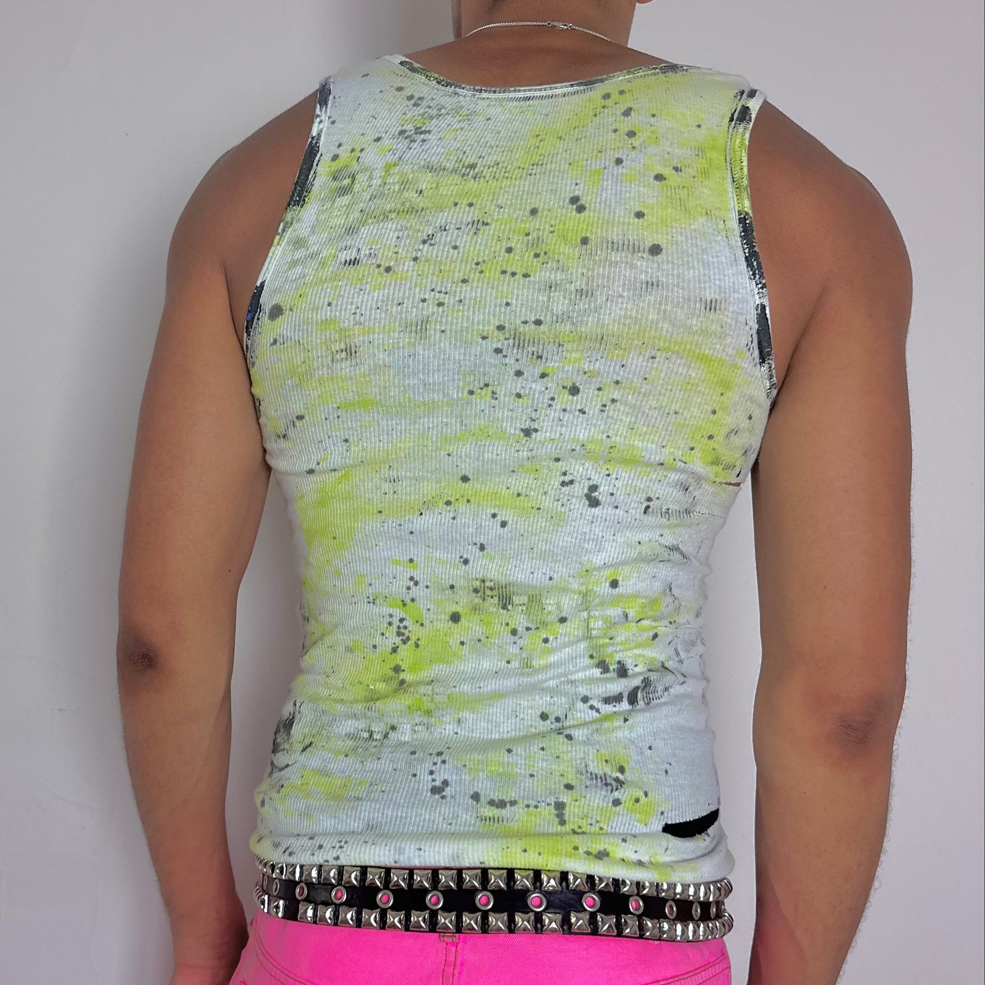 ASTROBOI* x Gildan 'Blitz' white and green printed tank top, rear view showing digital camo and flame print detail, worn by male model.