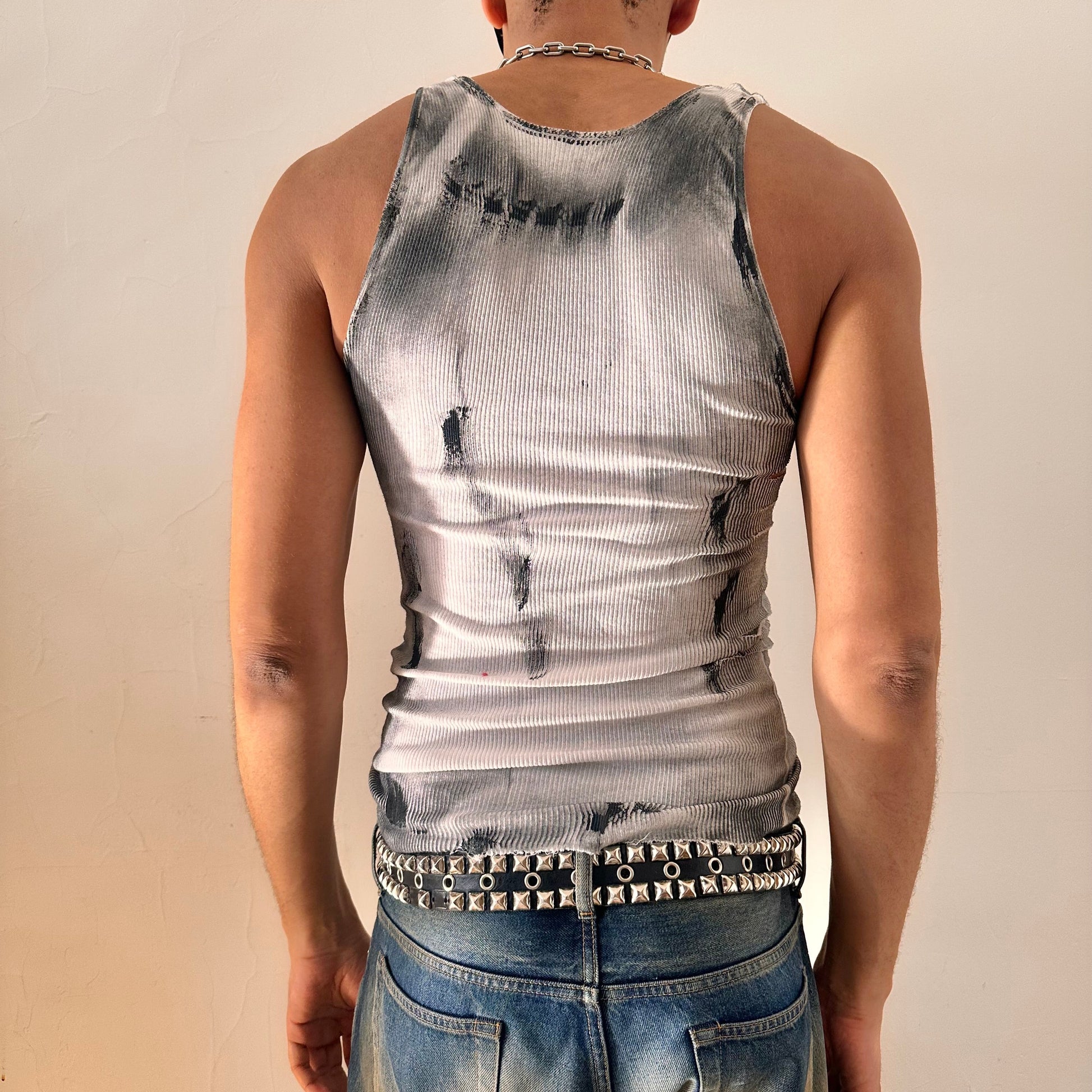 Back of ASTROBOI* x Hanes 'Hero' white ribbed cotton tank top with hand-painted black abstract graphic print and deconstructed cut-outs along chest and sides, customized at ASTROBOI* STUDIO in NYC.