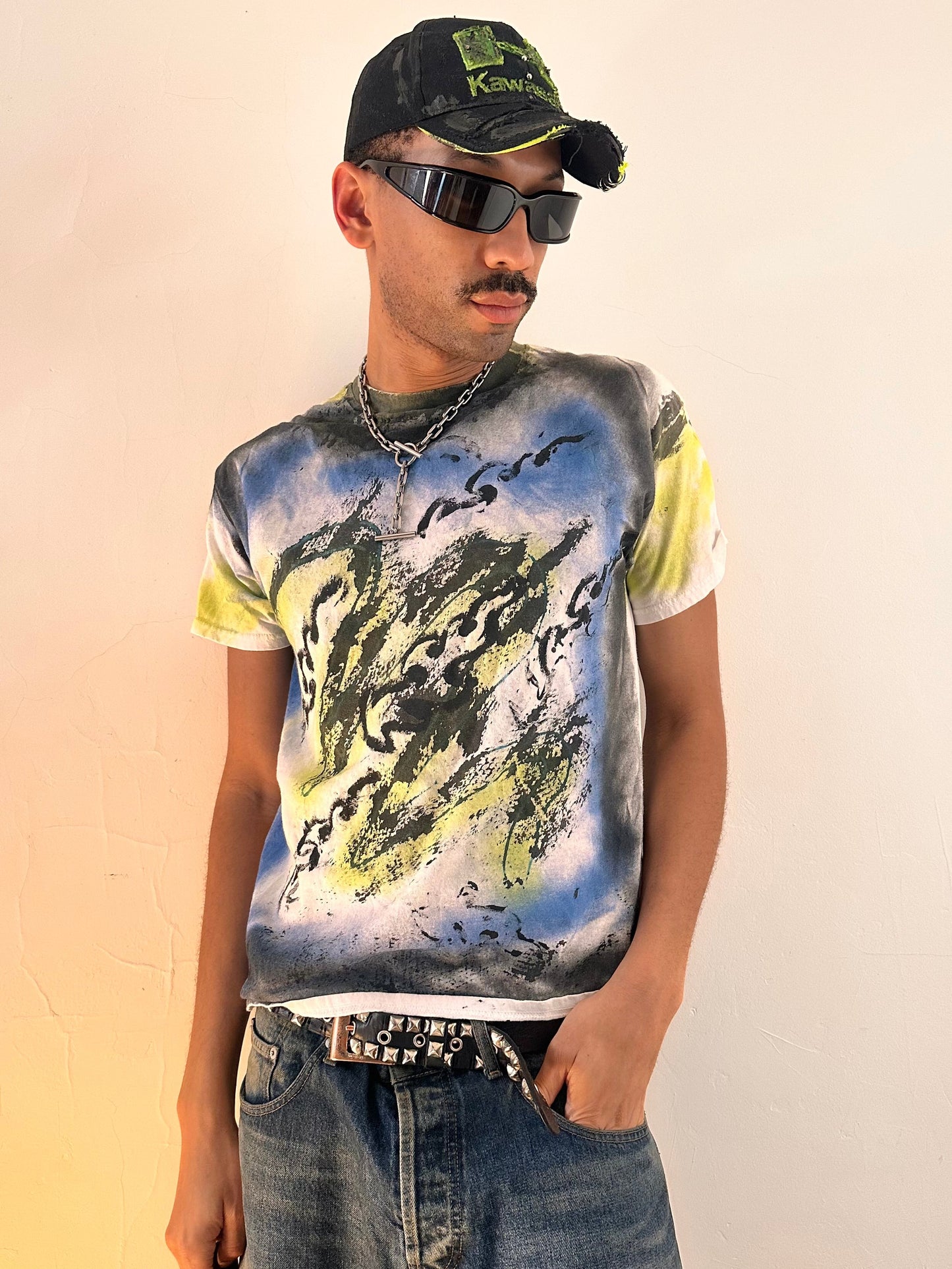 Styled image of ASTROBOI* x Gildan Otis black tattoo print graphic T-shirt in heavyweight cotton with hand-painted design, relaxed fit, NYC streetwear style