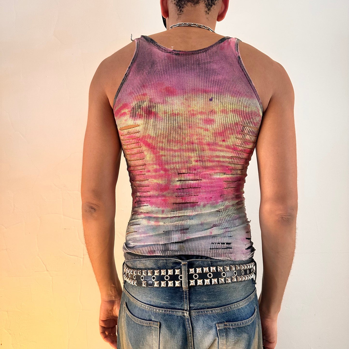ASTROBOI* x Hanes 'Skies' slim-fit tie dye tank top with cut-outs along the back, worn by male model, rear view.