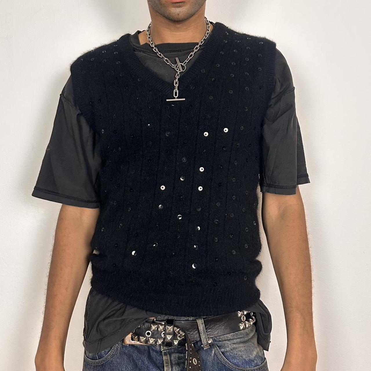 Ann Taylor black sweater vest made from lambswool and angora with sequin detailing on the front, boxy fit, size medium, front view