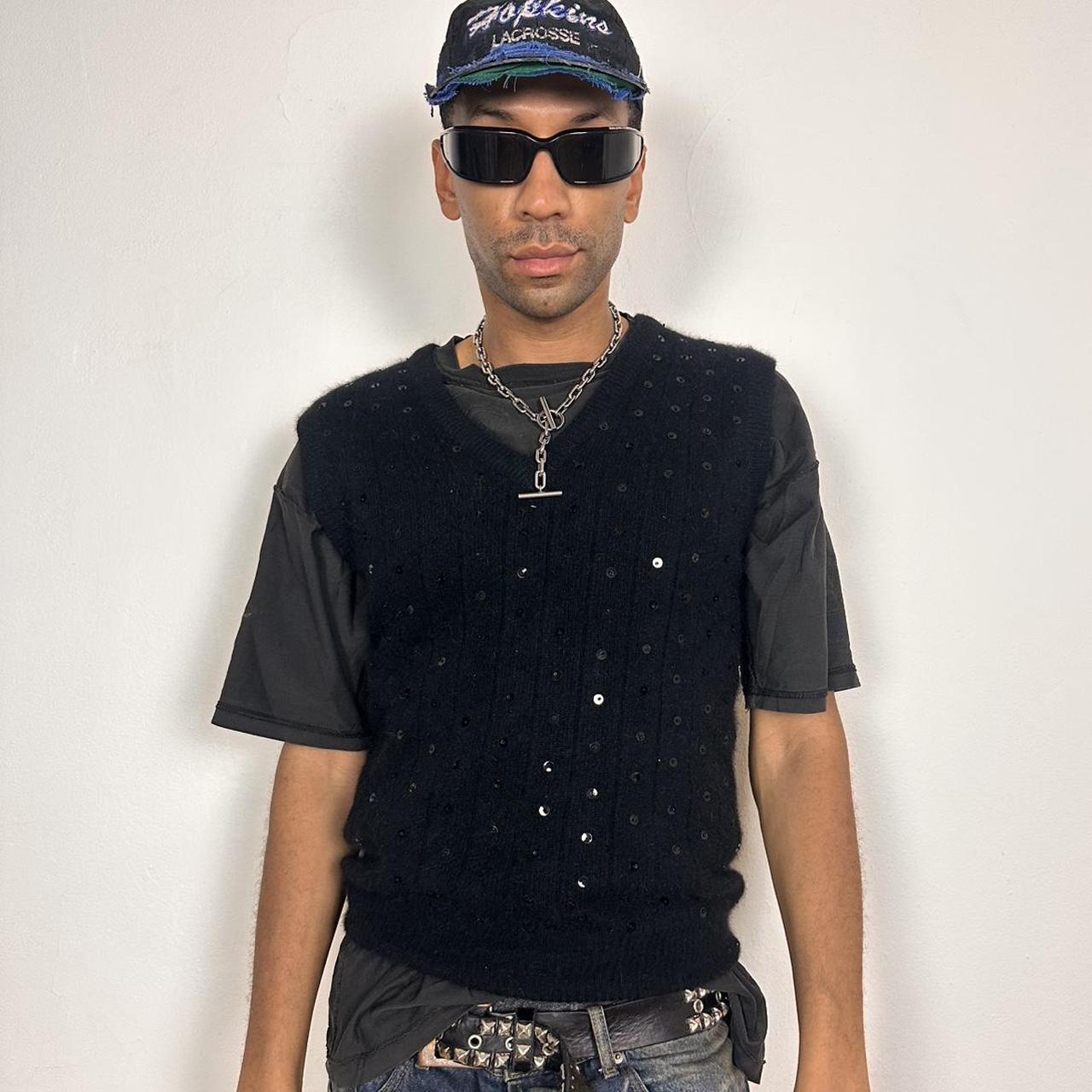 Ann Taylor black sweater vest made from lambswool and angora with sequin detailing on the front, boxy fit, size medium, overview