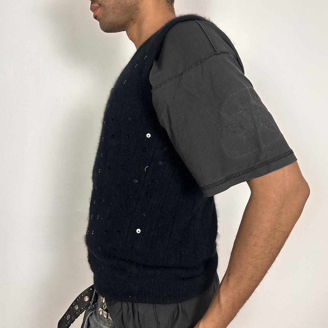 Ann Taylor black sweater vest made from lambswool and angora with sequin detailing on the front, boxy fit, size medium, left side