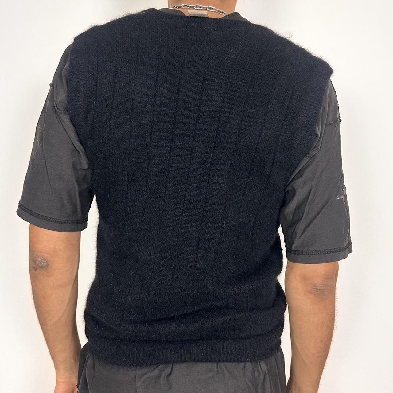 Ann Taylor black sweater vest made from lambswool and angora with sequin detailing on the front, boxy fit, size medium, back side