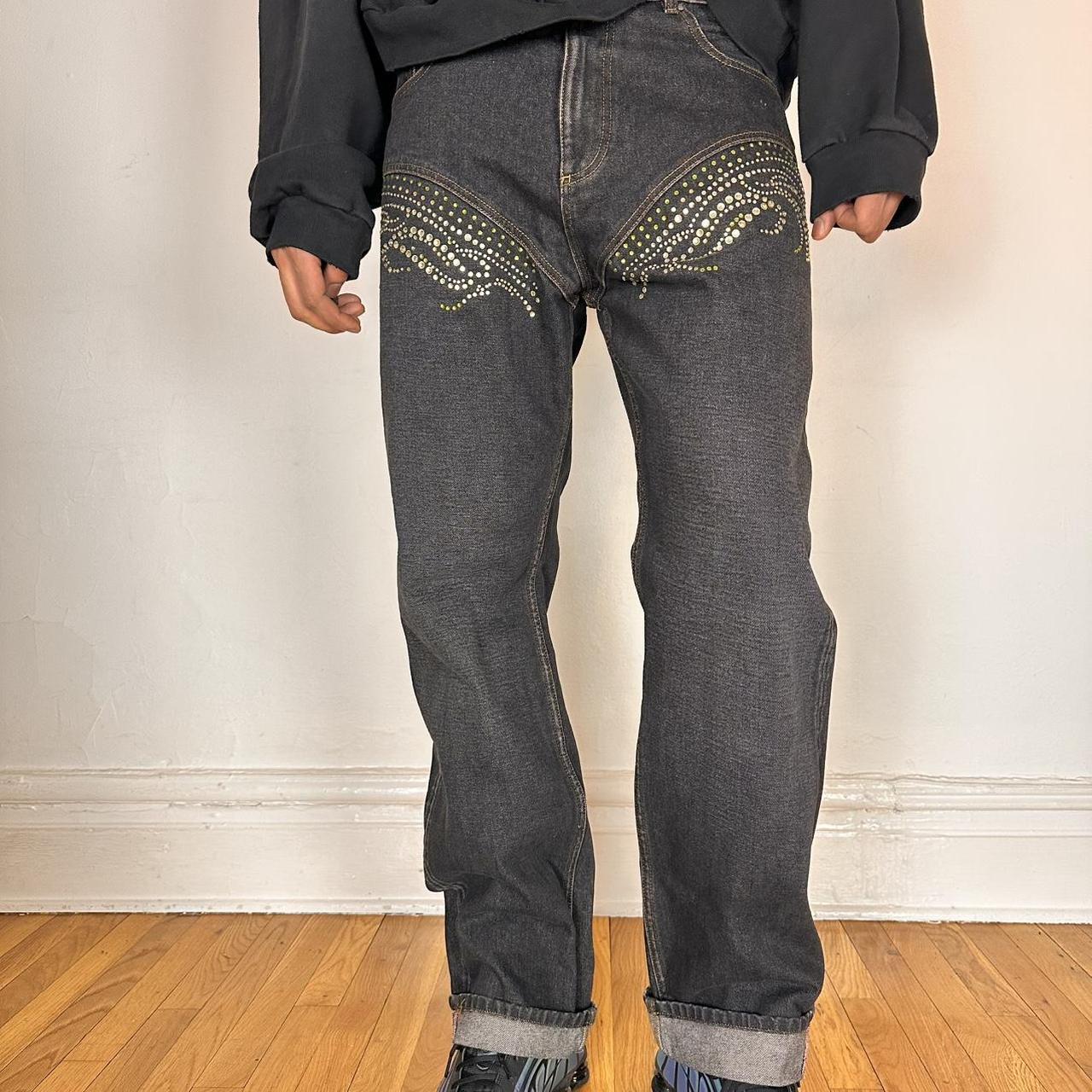 Front of Y/PROJECT black western cowboy jeans with green and clear rhinestones along both legs, straight-leg fit, size 36x32