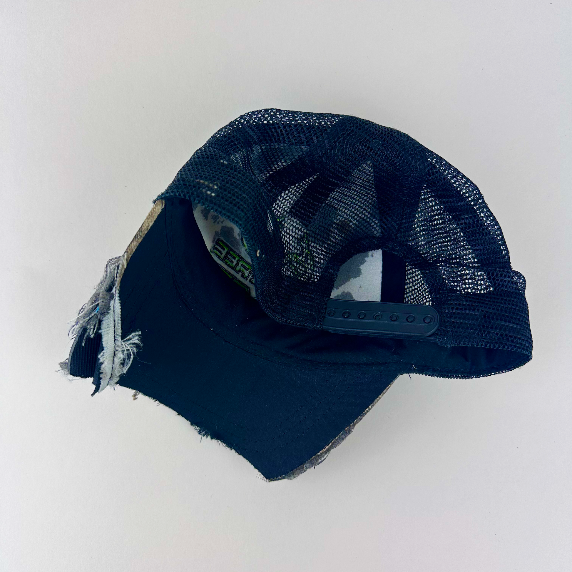 ASTROBOI* x RealTree 'Edge' brown camo rhinestone cap, rear view showing mesh ventilated back panel and adjustable strap.