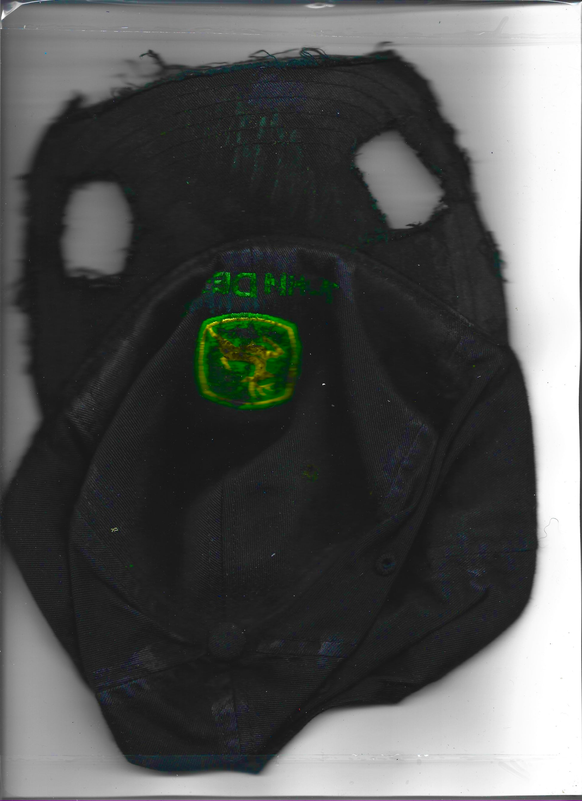 ASTROBOI* x John Deere 'Hyland' black distressed cut out hat, front view scanned image.
