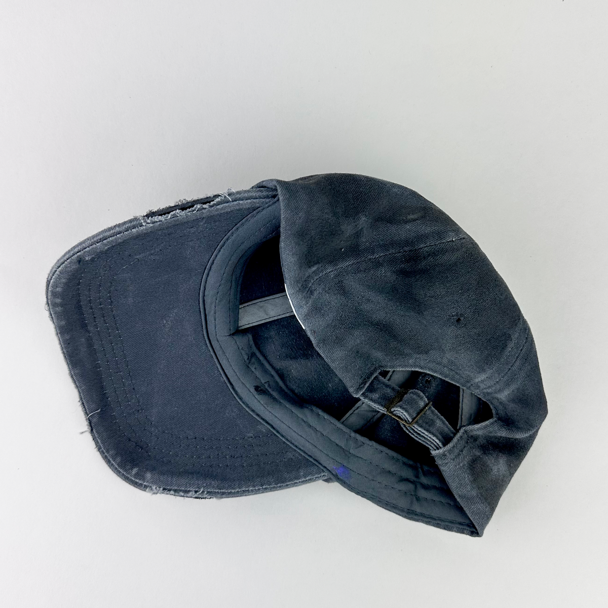 ASTROBOI* 'Slick' black and gray indie studded cap, rear view showing adjustable strap back.