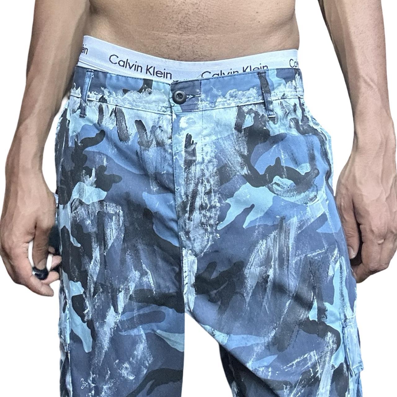 ASTROBOI* x ROTHCO Painted Blue Camouflage Utility Shorts - close up 