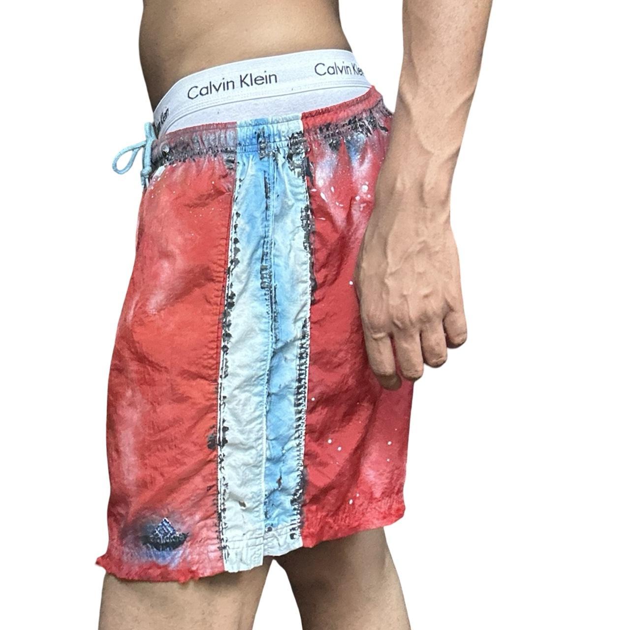 ASTROBOI* x Adidas Orange Nylon Rhinestone Grunge Shorts - left 