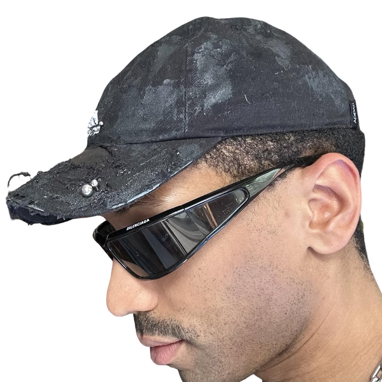 ASTROBOI* x Adidas 'Kink' Black Distressed Pierced Hat - left 