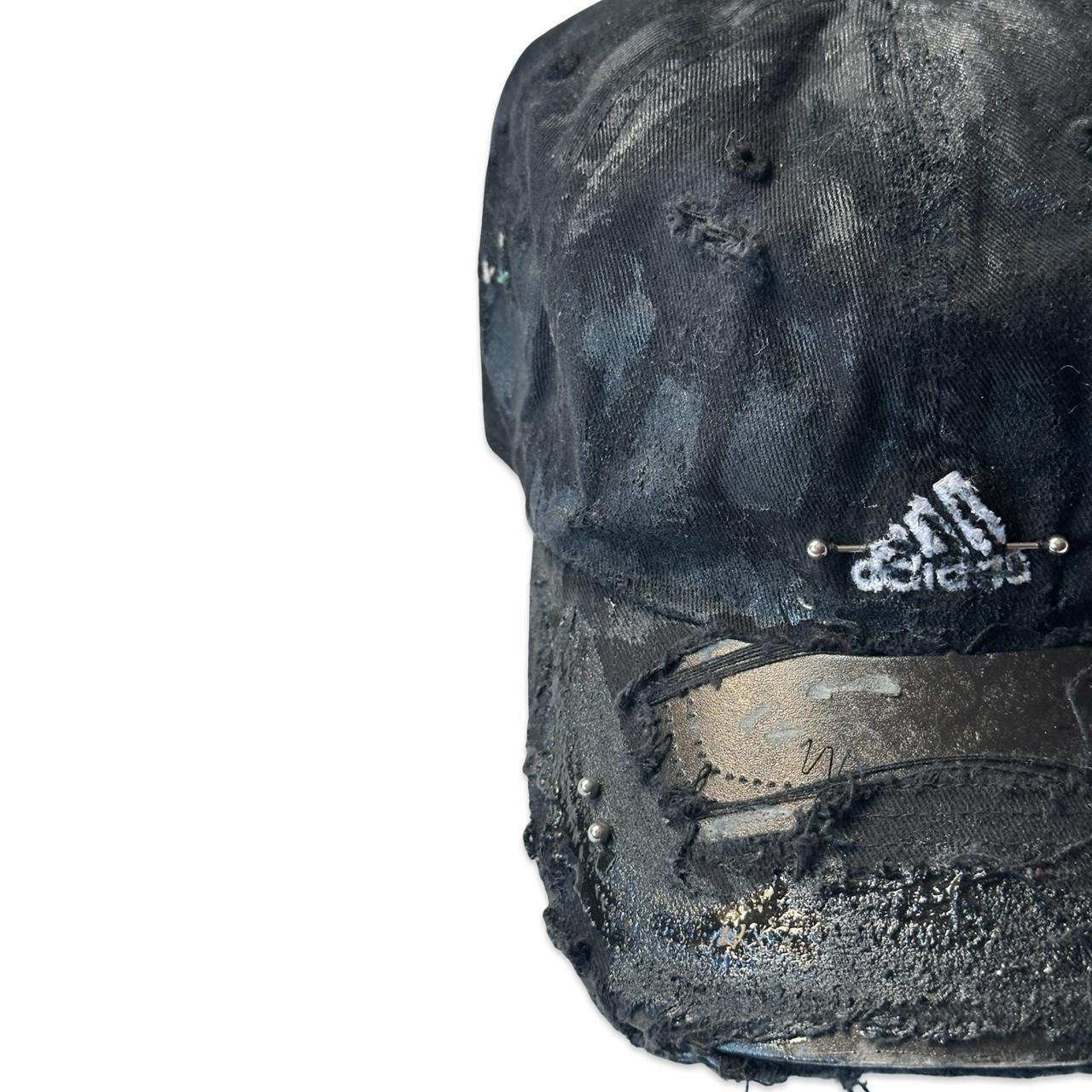 ASTROBOI* x Adidas 'Kink' Black Distressed Pierced Hat - flat left 