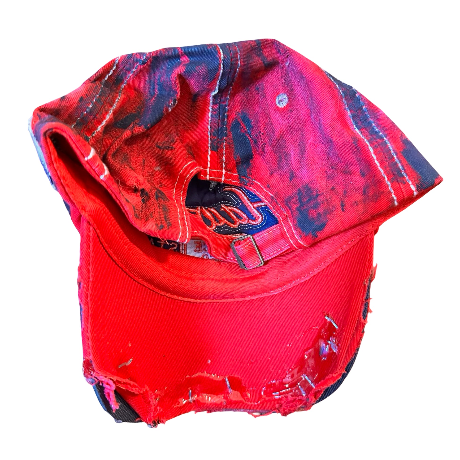 Flay lay back of Blue and red ASTROBOI* hat featuring a purple resin-coated Hawaii graphic, deconstructed visor with clear resin, and black painted accents.