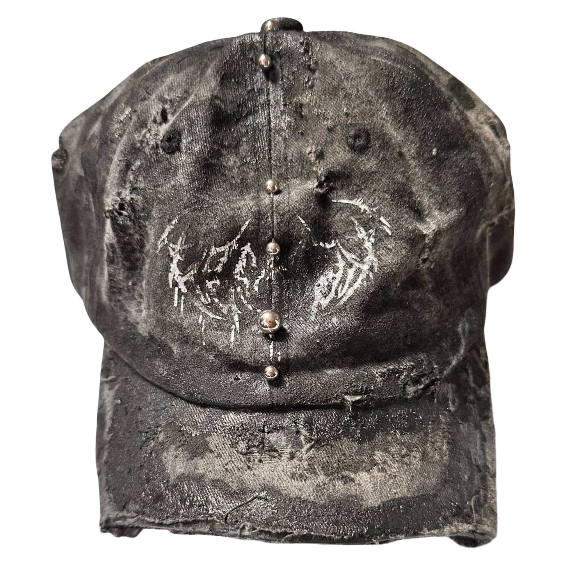 Flat front of Black distressed half-visor hat with barbed-wire logo, adjustable strap, black paint details, and stainless steel piercings along the brim.