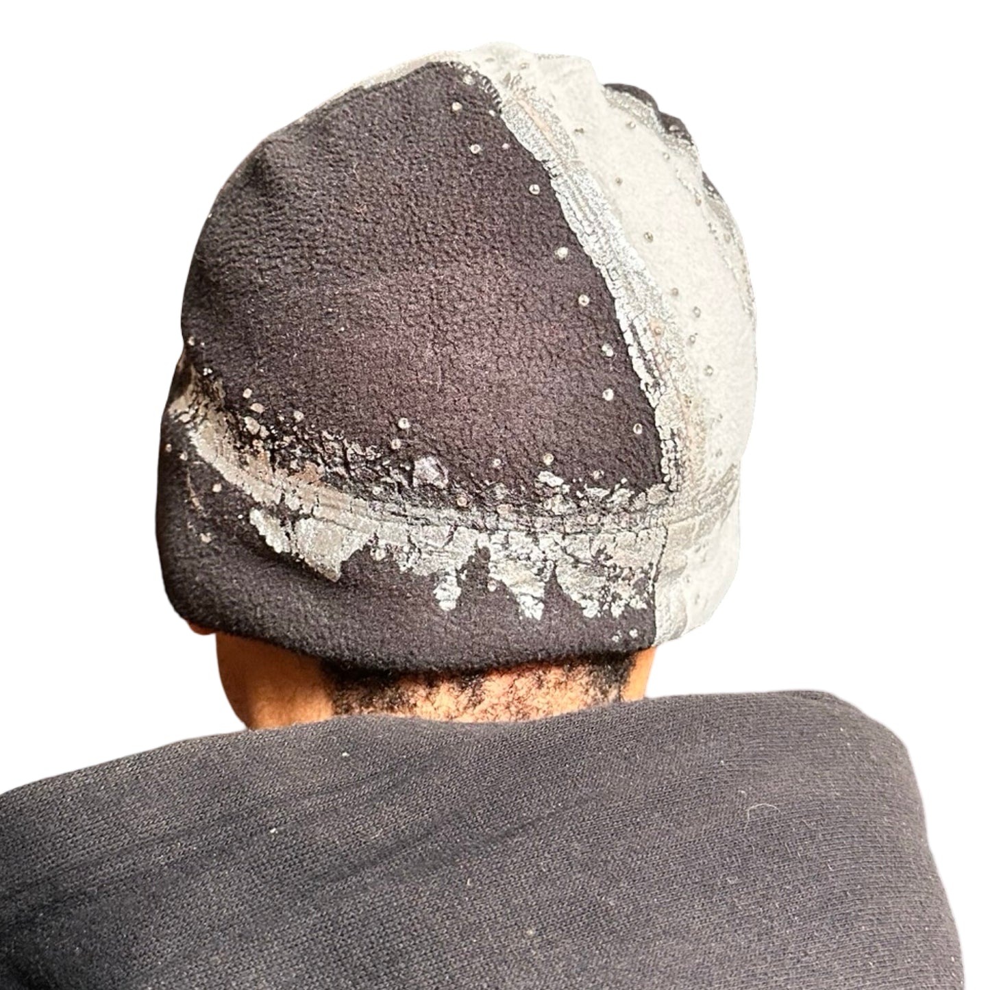 Back of ASTROBOI* black and white fleece beanie with silver rhinestone paint and tonal rhinestones. Custom handmade winter hat from ASTROBOI* STUDIO in NYC.