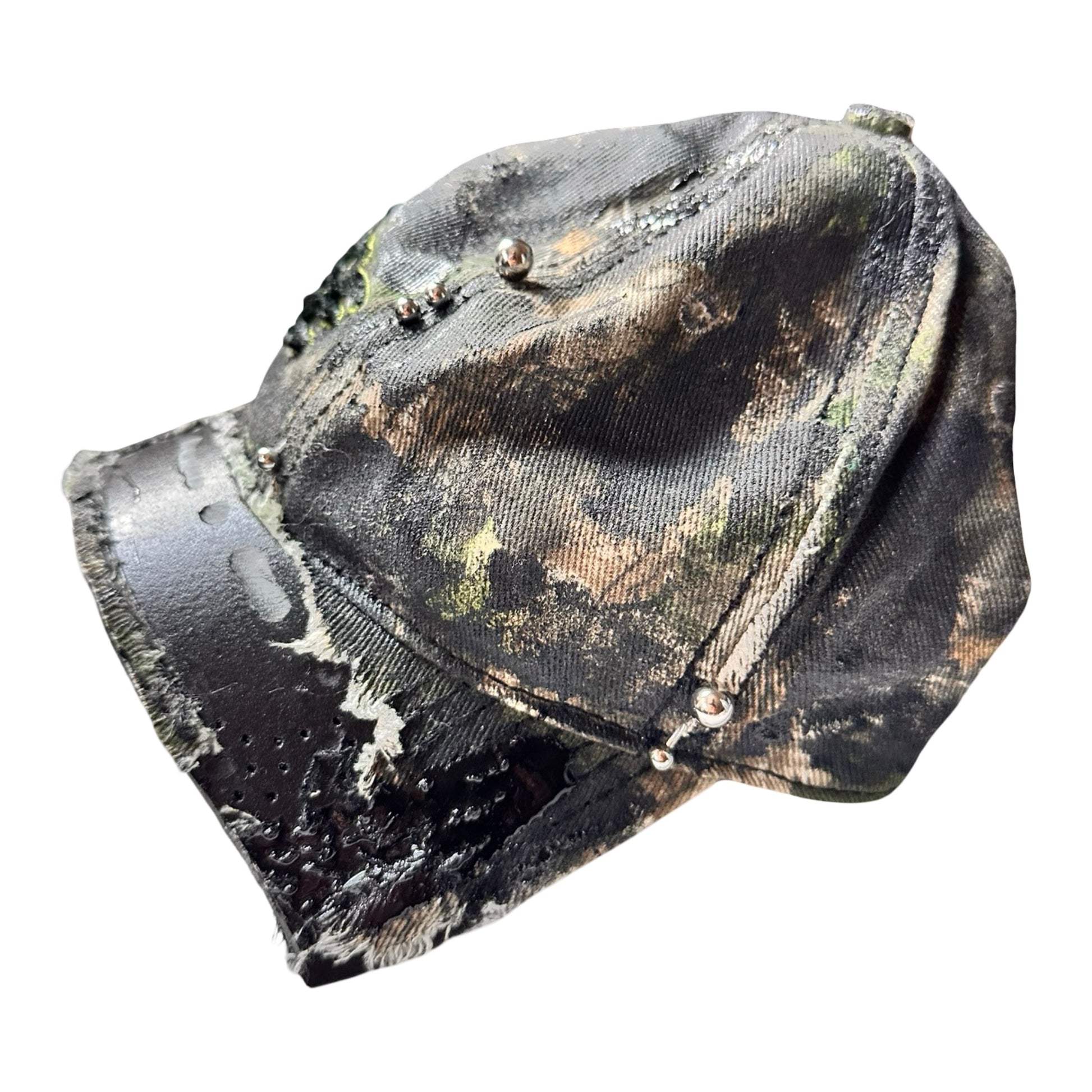 Flat left side of Brown RealTree distressed half-visor hat with elastic base, black resin detailing, and a sawed-off visor for a deconstructed Y2K aesthetic.