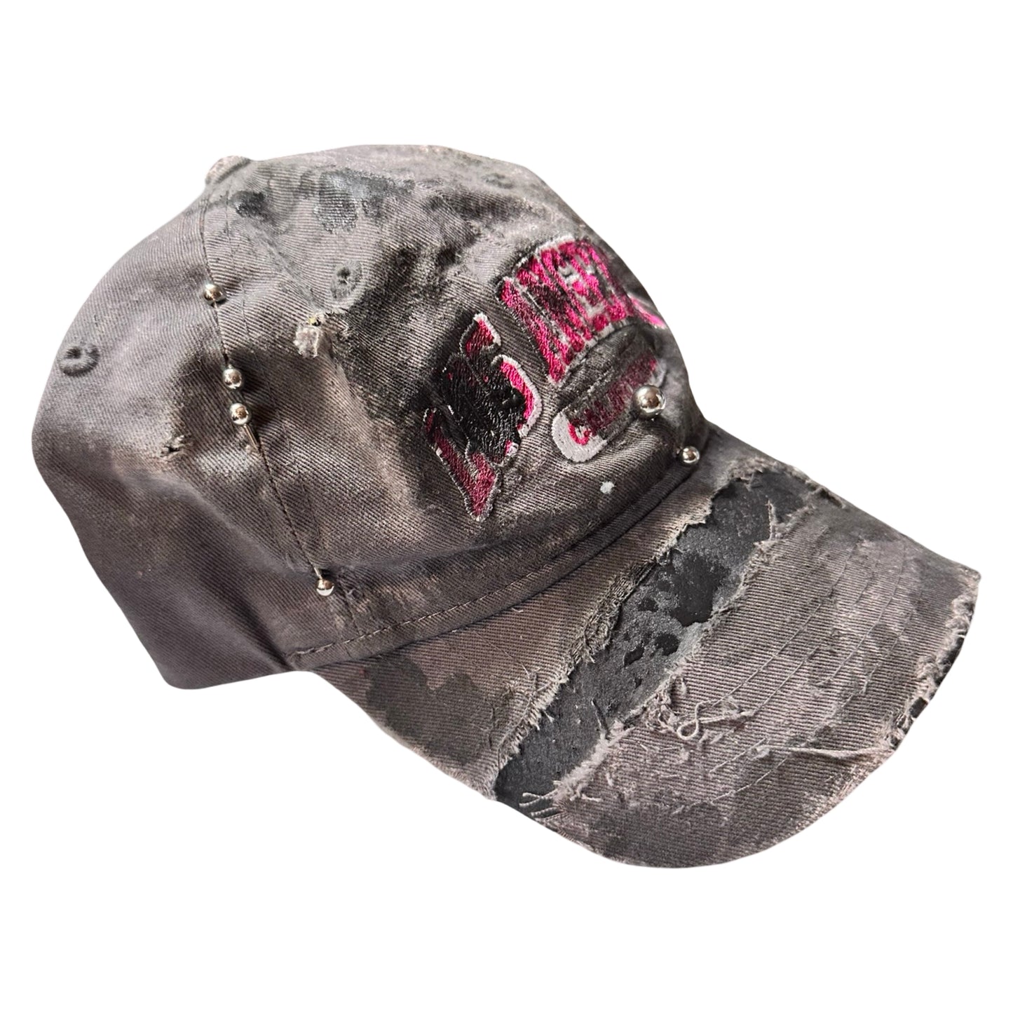 Flat right side of Grey and pink distressed half-visor hat with ‘Los Angeles’ embroidery, black paint, and stainless steel piercings, customized by ASTROBOI*.