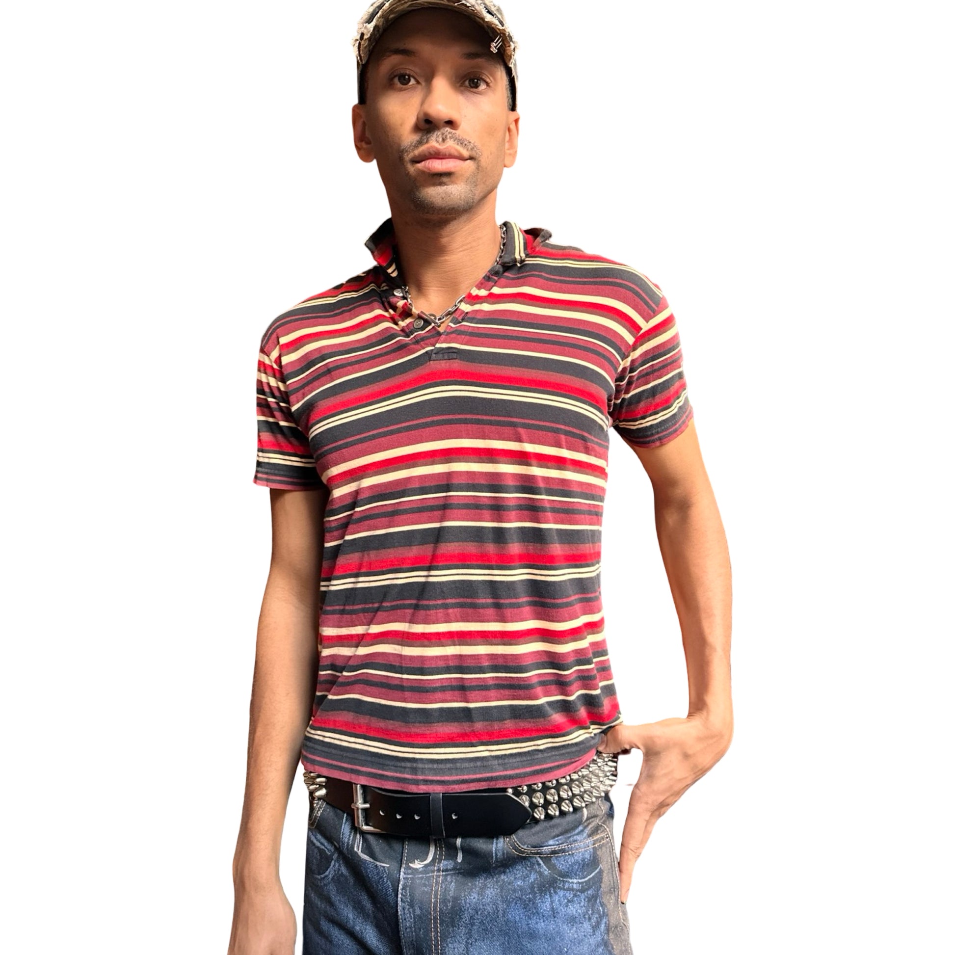 Styled view of Vintage Issey Miyake Homme Plus striped cotton polo shirt in men’s small with two-button neckline and multicolor variegated stripes.