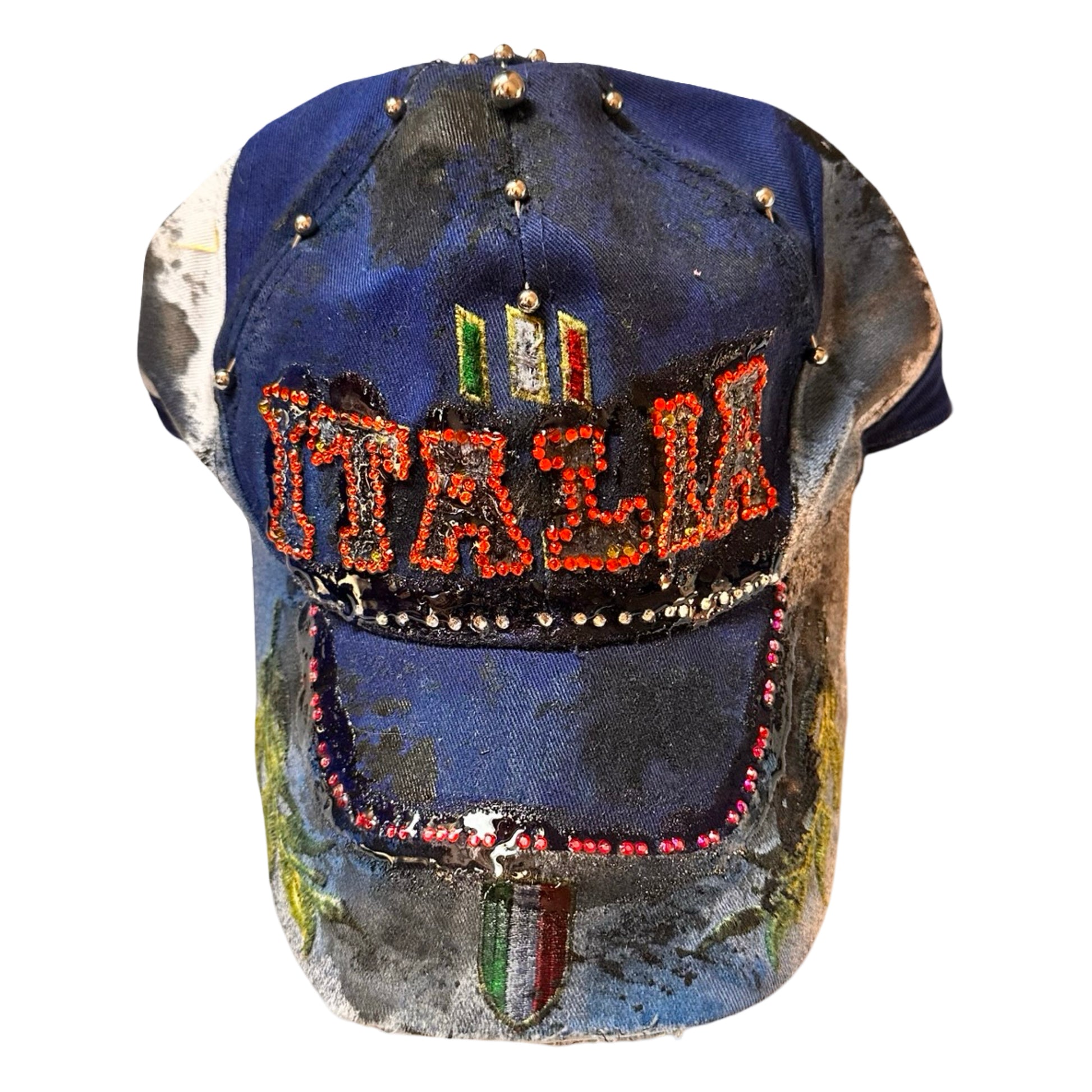 Flat front of Upcycled blue and white ASTROBOI* ‘ITALIA’ hat with rhinestones, resin, custom paint, and stainless steel piercings, handcrafted in NYC.