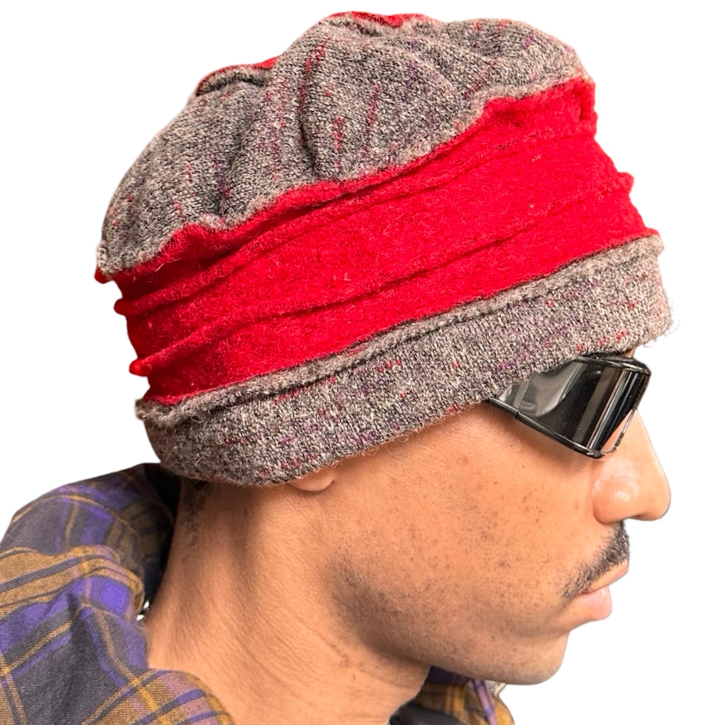 Right side of ASTROBOI* red and grey pleated beanie with slouchy fit and patchwork panels, handmade in NYC.