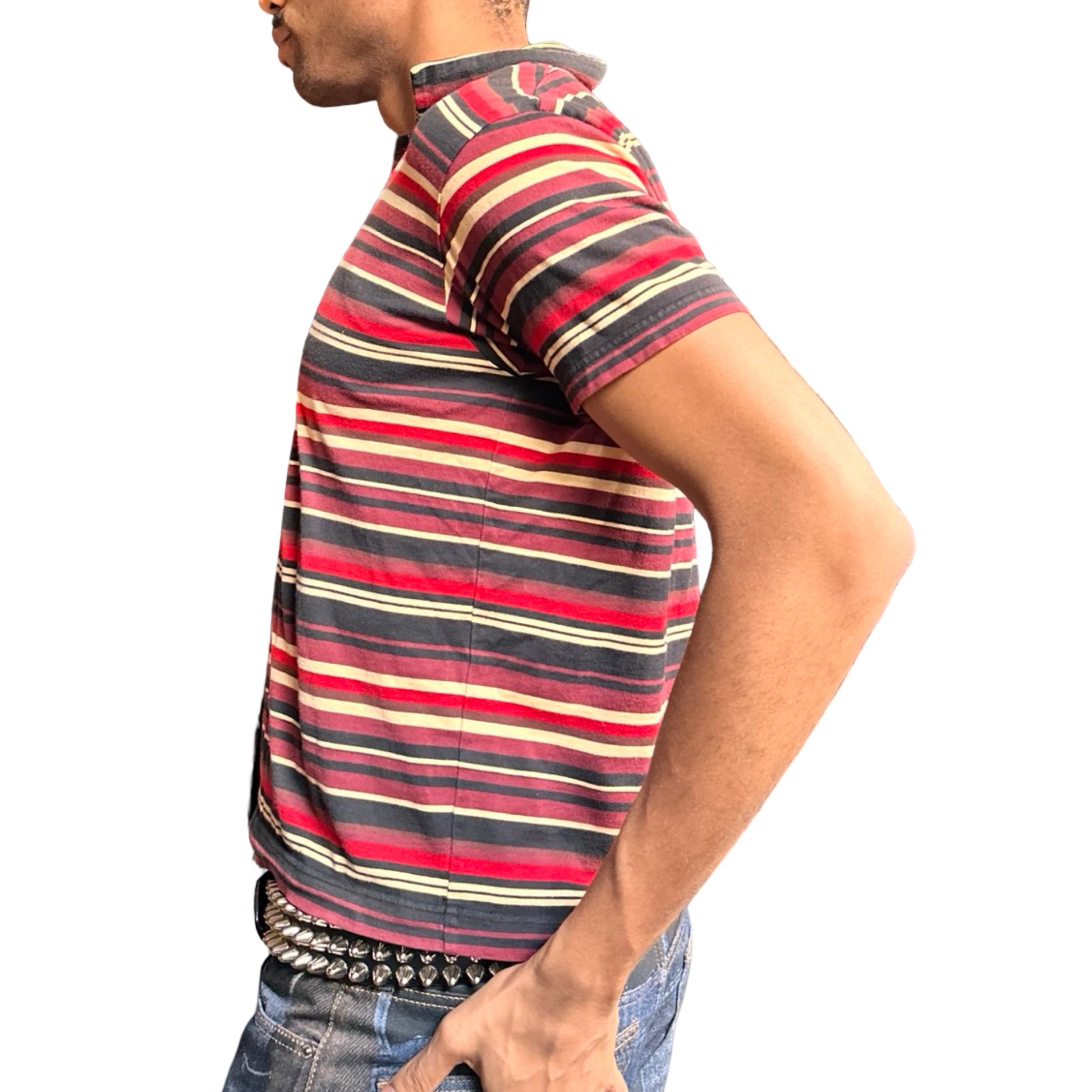 Left side of Vintage Issey Miyake Homme Plus striped cotton polo shirt in men’s small with two-button neckline and multicolor variegated stripes.