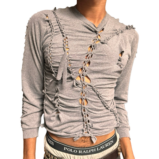 Gray long-sleeve top with braided design on a white background